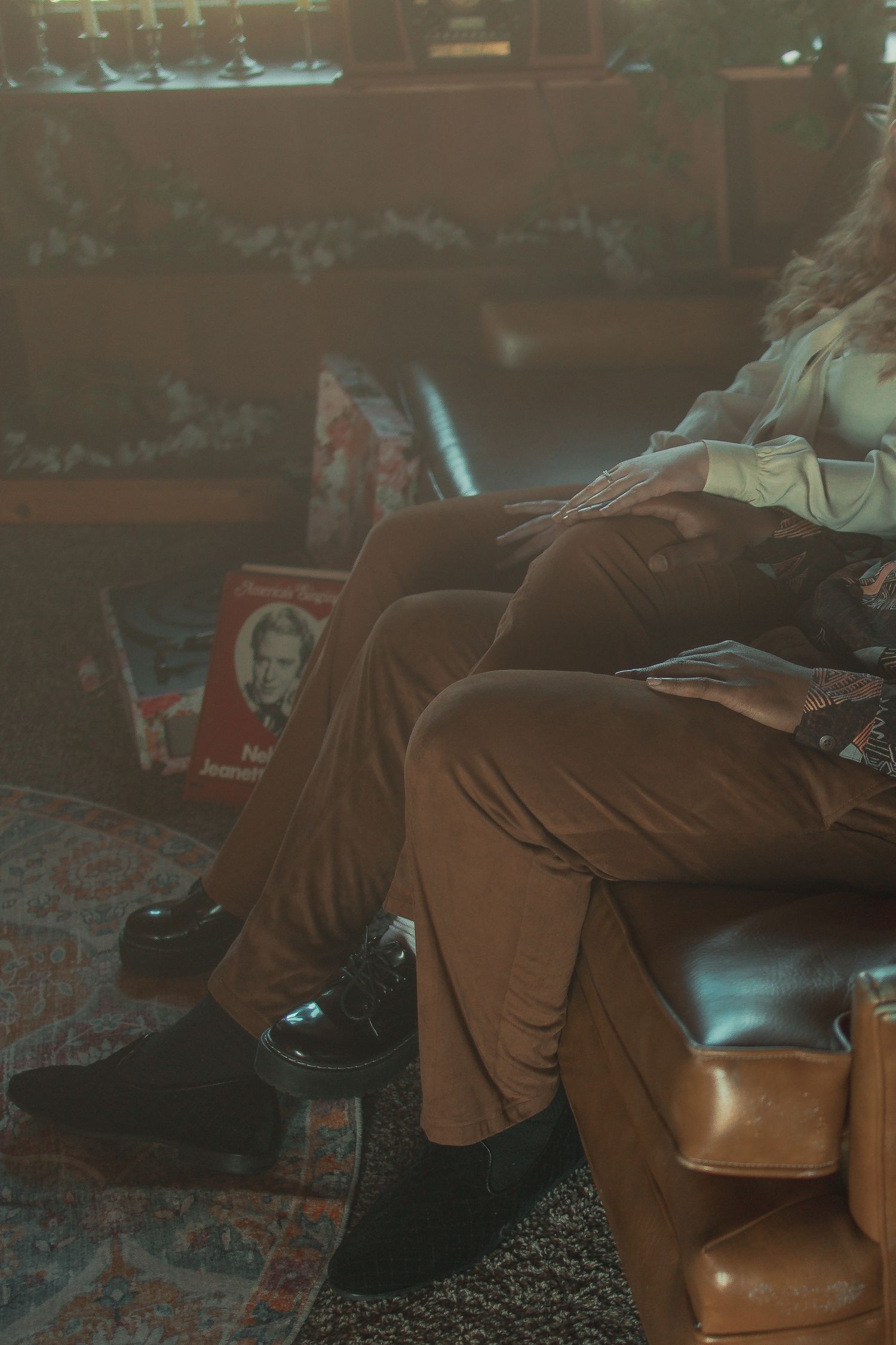 Vintage couple on a date with records in Akron Ohio by Gypsy Lens Photography. Moody, vintage, documentary wedding photography.