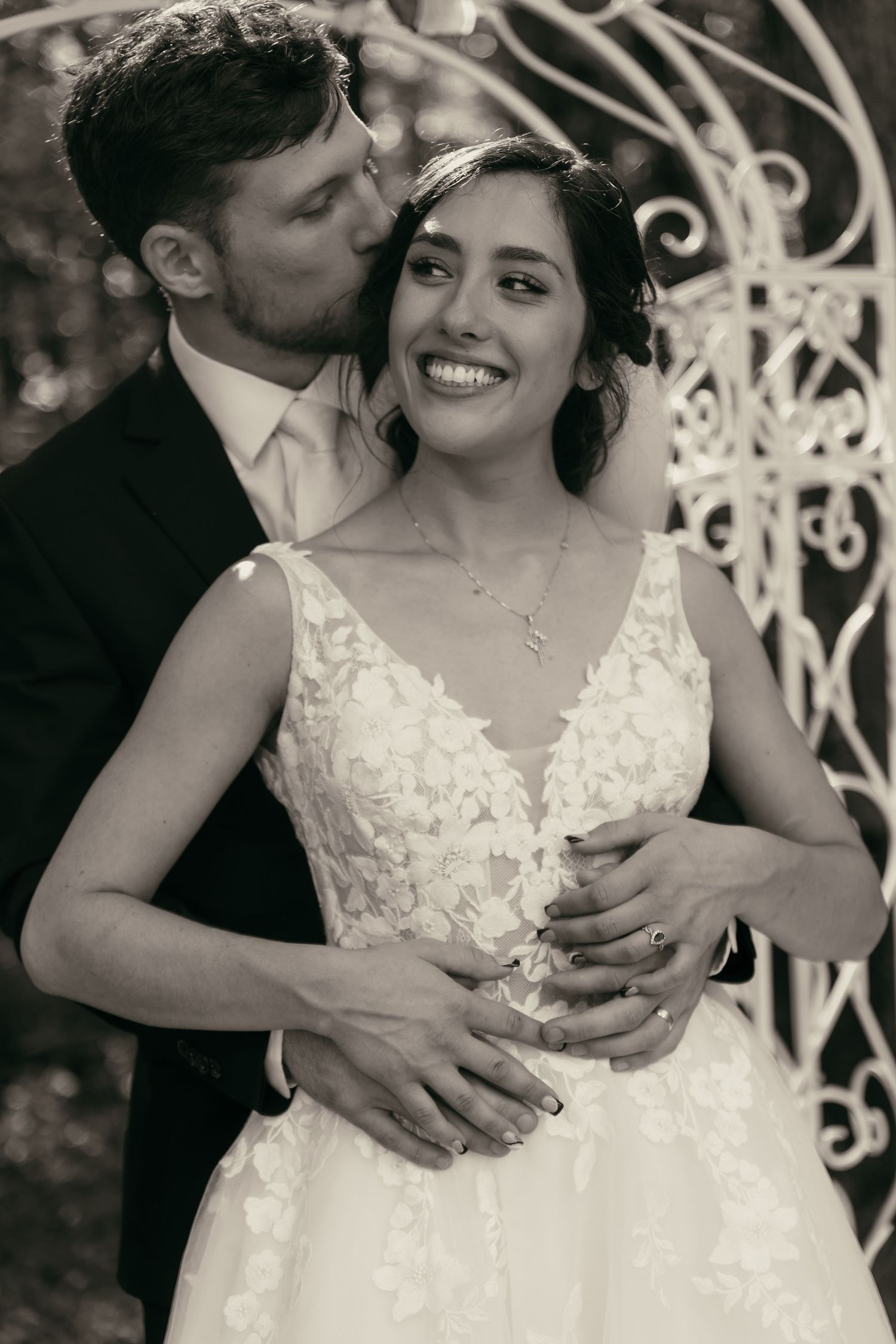 Black and white moment of bride and groom in Cleveland Ohio by Gypsy Lens Photography. Moody, vintage, nostalgic, documentary wedding.