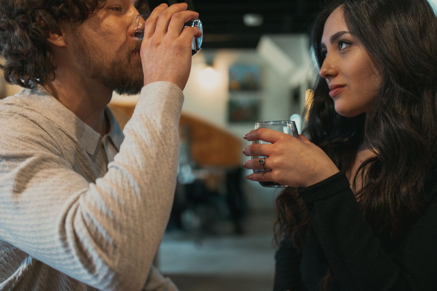 Engagement session at wine cellar in Cleveland Ohio by Gypsy Lens Photography. Moody, vintage, documentary wedding photographer.