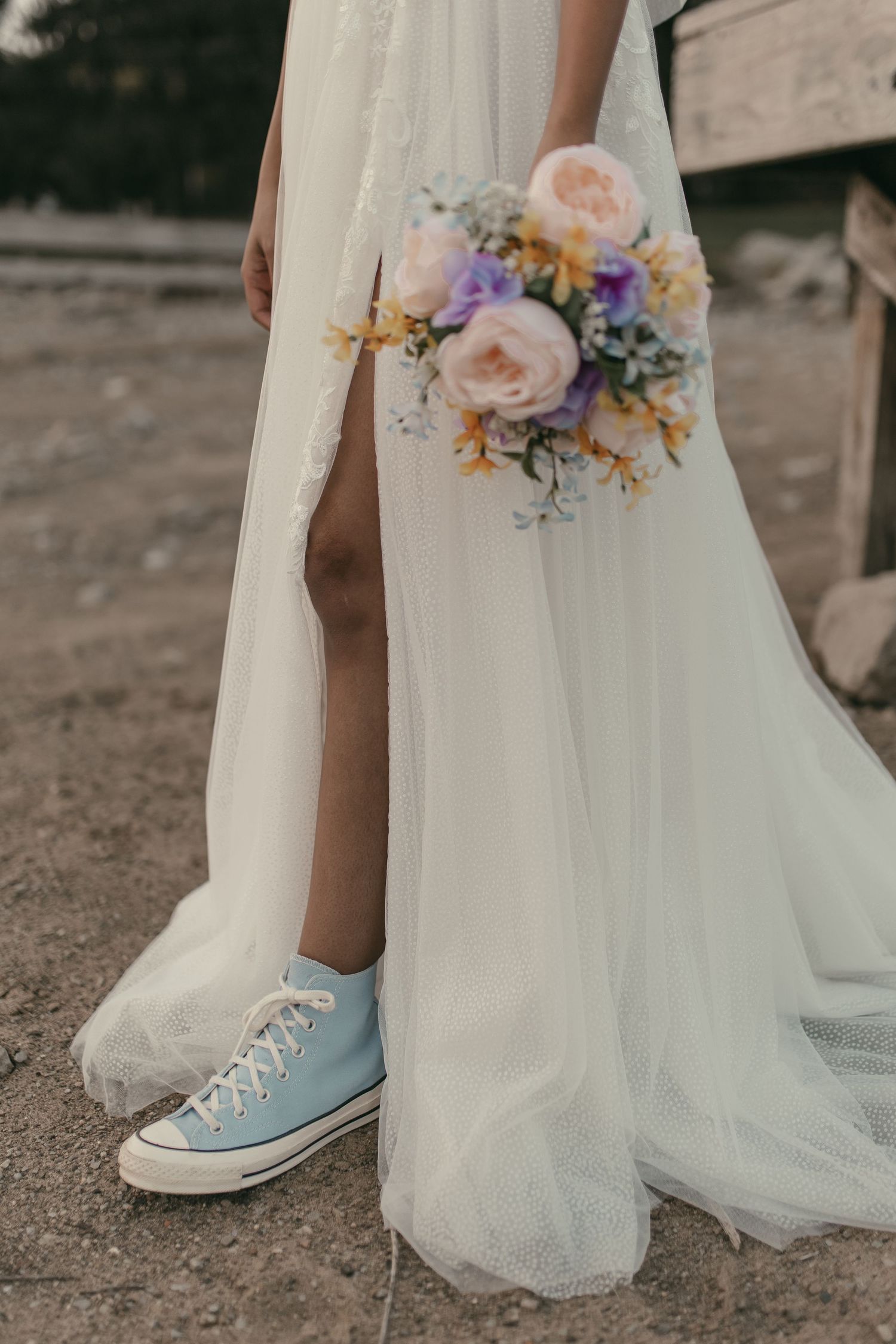 Bride in wedding dress with shoes and bouquet in Cleveland Ohio by Gypsy Lens Photography. Moody, vintage, documentary wedding photography.