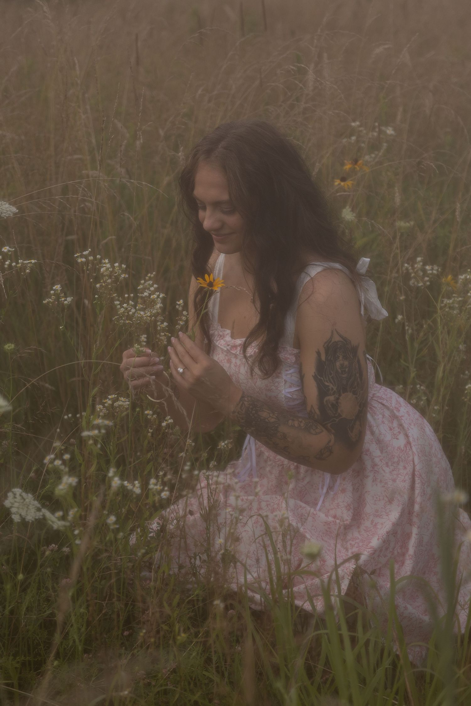 Dreamy portrait in a wildflower meadow in Lake County Ohio by Gypsy Lens Photography. Moody, filmy, vintage, documentary wedding photography