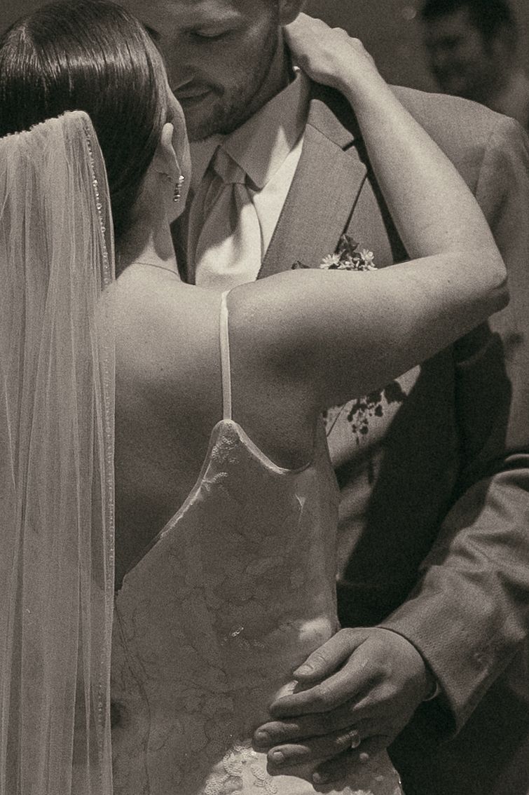 Bride and groom grainy vintage black and white first dance in Ashtabula Ohio by Gypsy Lens Photography. Moody, vintage, documentary wedding.