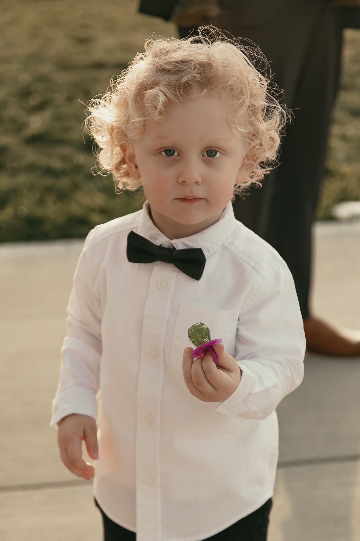 Cinematic sunset family portraits at wedding in Lake County Ohio by Gypsy Lens Photography. Moody, vintage, documentary wedding photography.