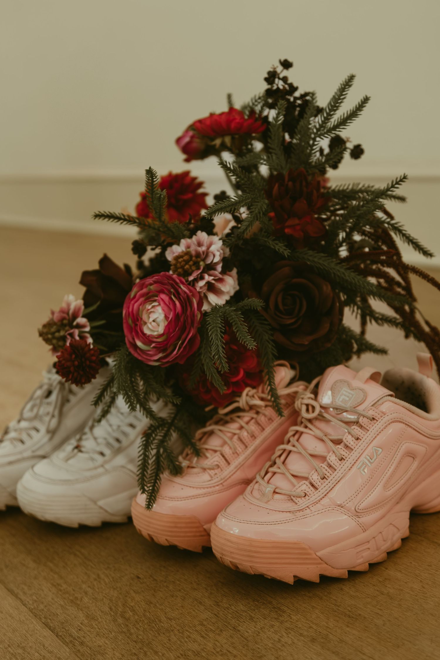 Two brides shoes and bouquets in Cleveland Ohio by Gypsy Lens Photography. Moody, filmy, vintage, documentary wedding photography.