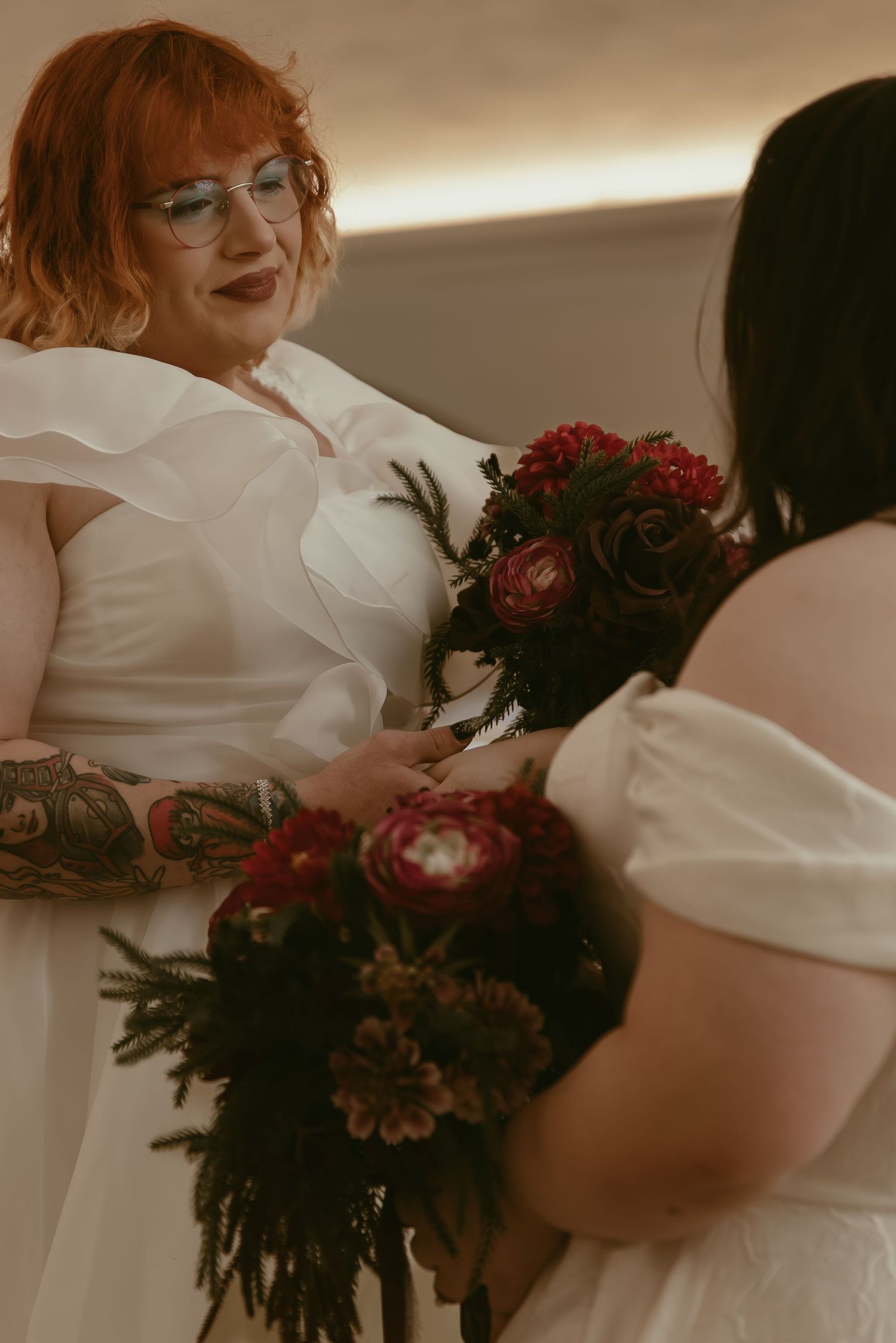 Bride admiring her bride to be in Cleveland Ohio by Gypsy Lens Photography. Moody, filmy, vintage, documentary wedding photography.