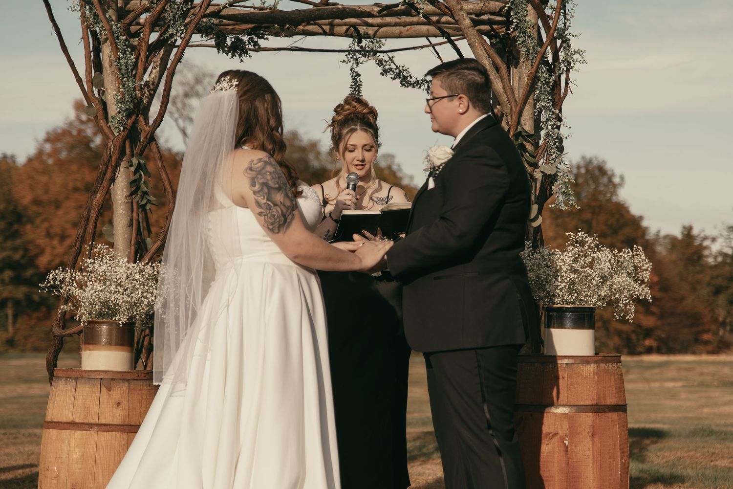Two brides being married at ceremony in Cleveland Ohio by Gypsy Lens Photography. Moody, vintage, documentary wedding photography.