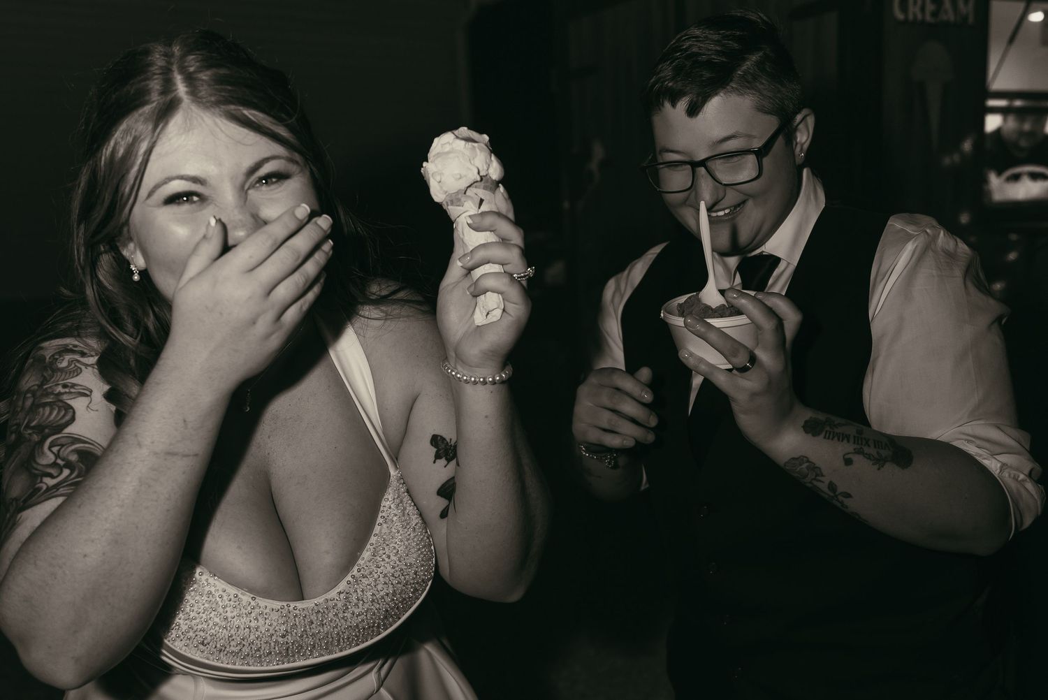 Two brides with ice cream truck on wedding day in Cleveland Ohio by Gypsy Lens Photography. Moody, vintage, documentary wedding photography.