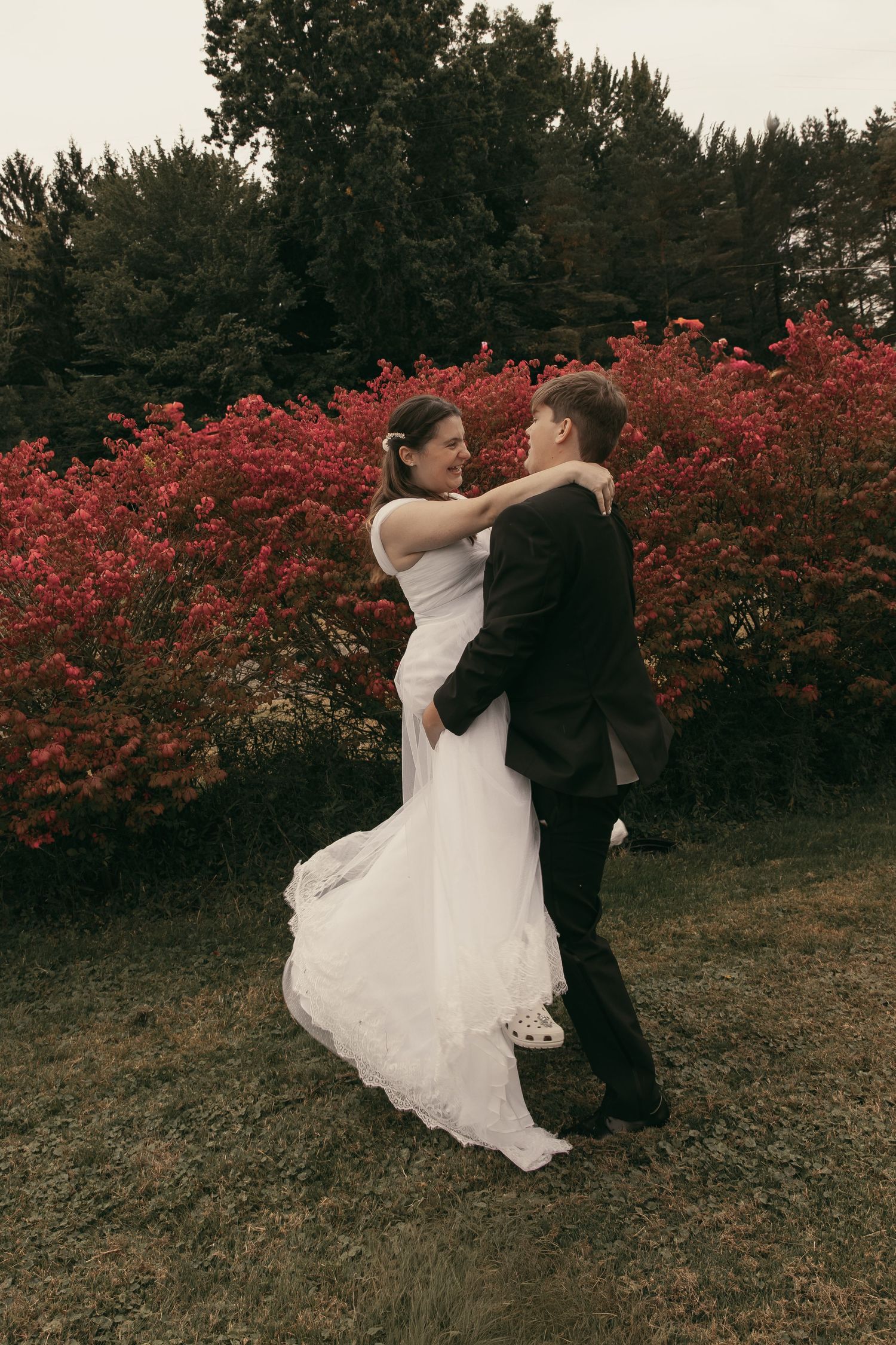 Motion blur artistic vintage couple running in Ashtabula Ohio by Gypsy Lens Photography. Moody, vintage, documentary wedding photography.