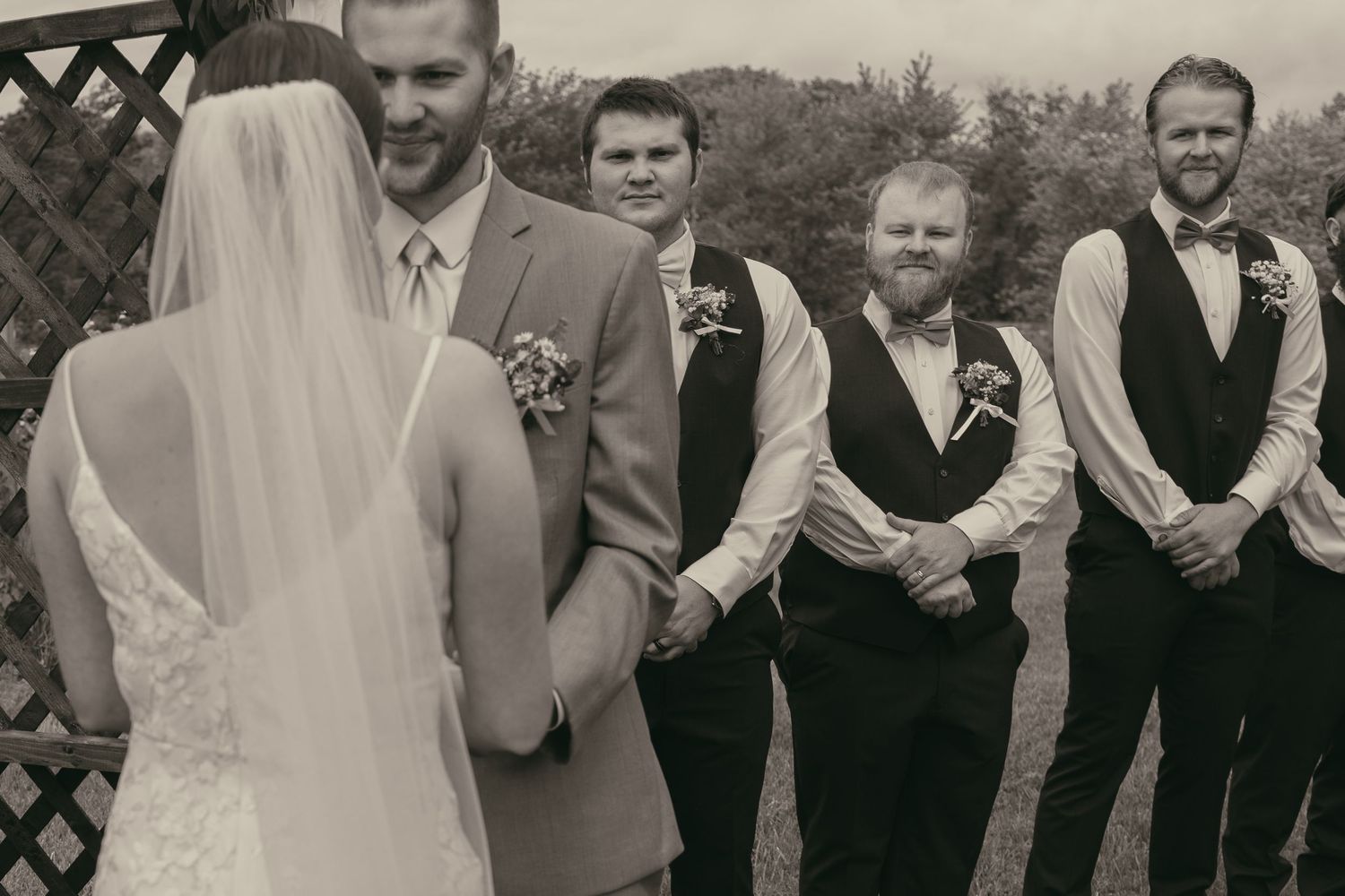 Bride and groom finally meet at the alter in Ashtabula Ohio by Gypsy Lens Photography. Moody, vintage, nostalgic, documentary wedding photo.