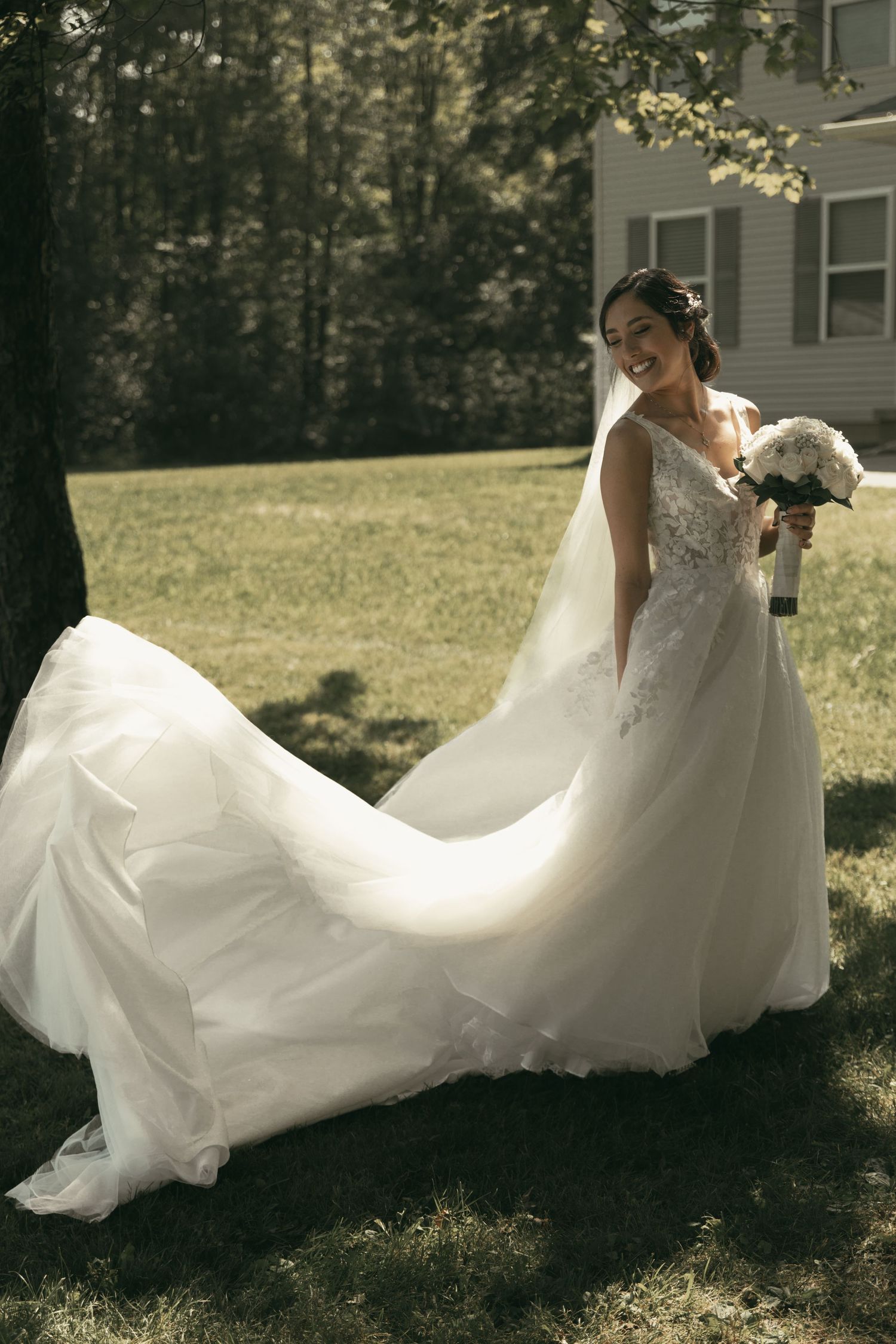 Flowy wedding dress and bride in Tallmadge Ohio by Gypsy Lens Photography. Moody, filmy, vintage, documentary wedding photography.