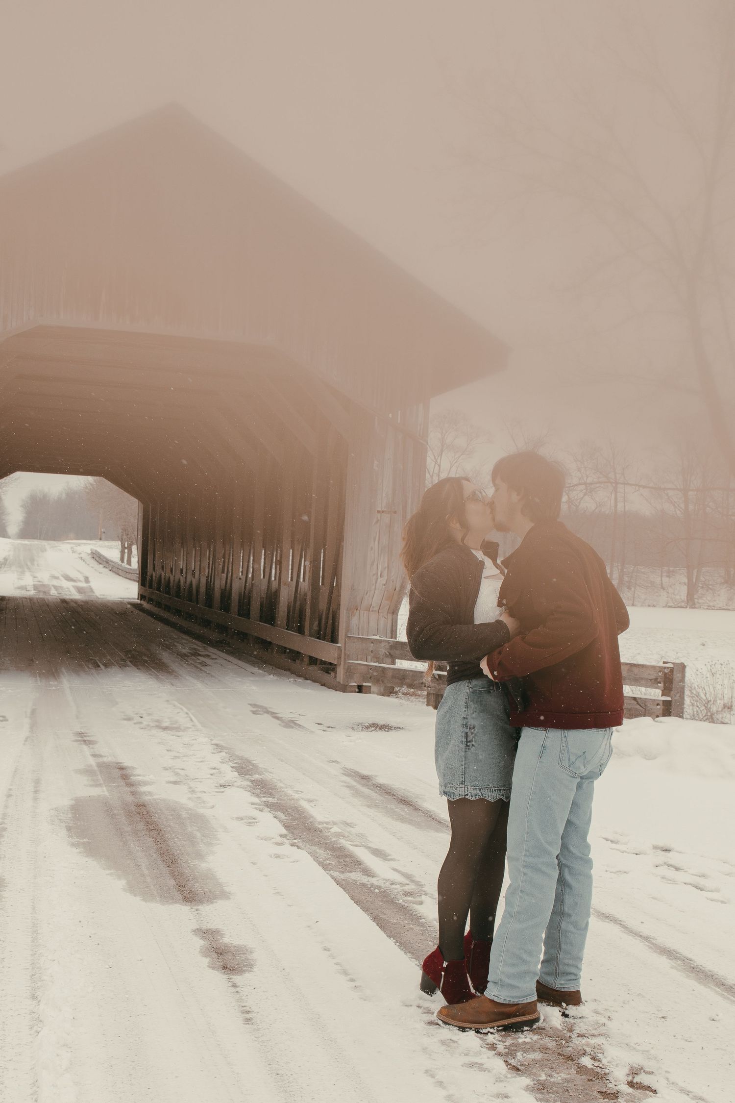 Filmy vintage grainy couple kissing in Ashtabula Ohio by Gypsy Lens Photography. Moody, vintage, documentary wedding photography.