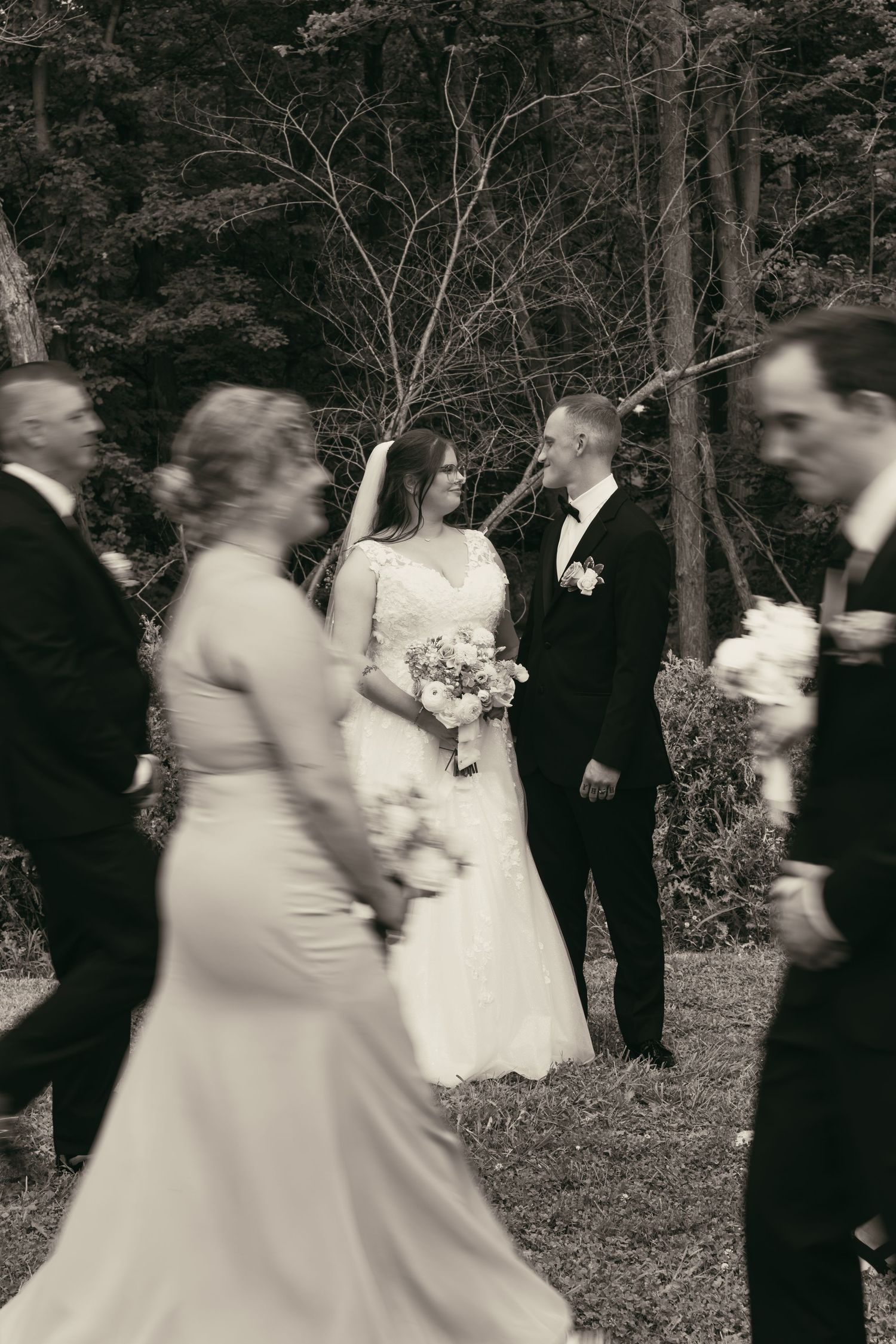 Newlyweds and bridal party in Cleveland Ohio by Gypsy Lens Photography. Moody, vintage, documentary wedding photographer.