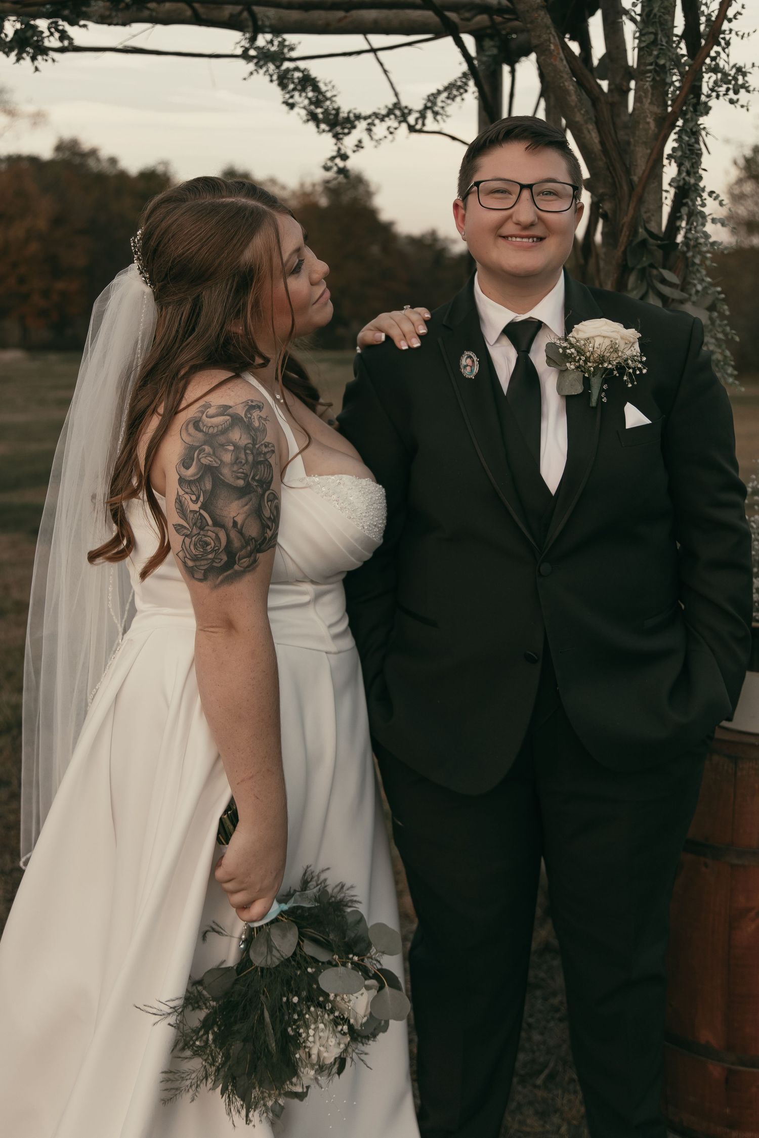 Bride looking at partner with love in Cleveland Ohio by Gypsy Lens Photography. Moody, vintage, documentary wedding photography.