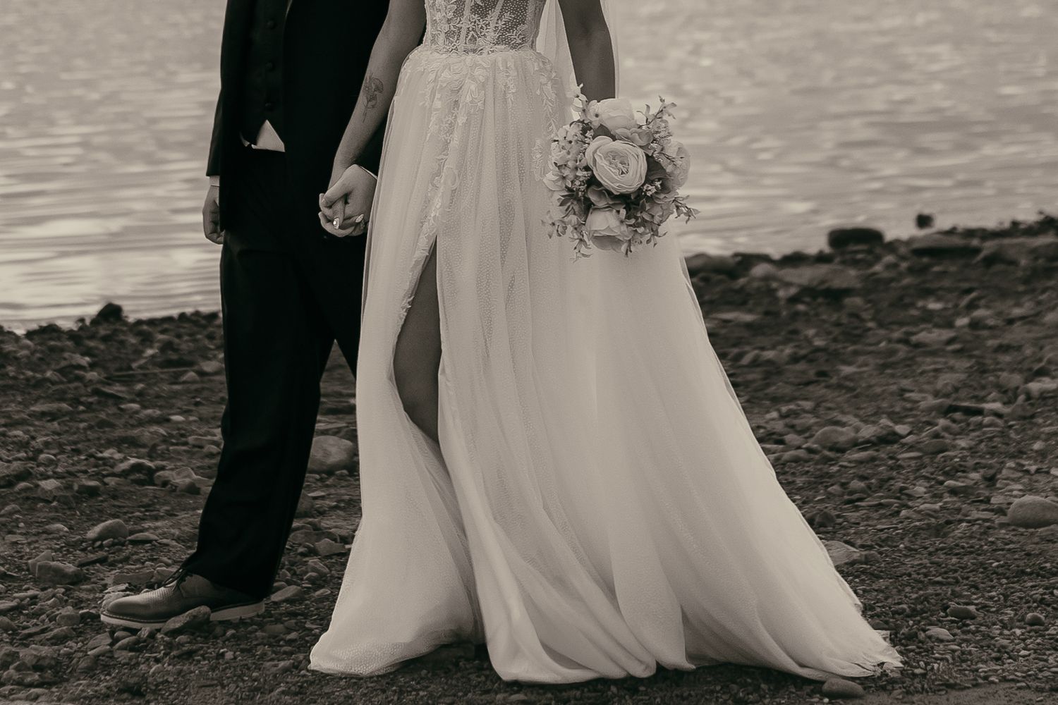 Bridal portraits on beach at sunset in Cleveland Ohio by Gypsy Lens Photography. Moody, vintage, documentary wedding photography.