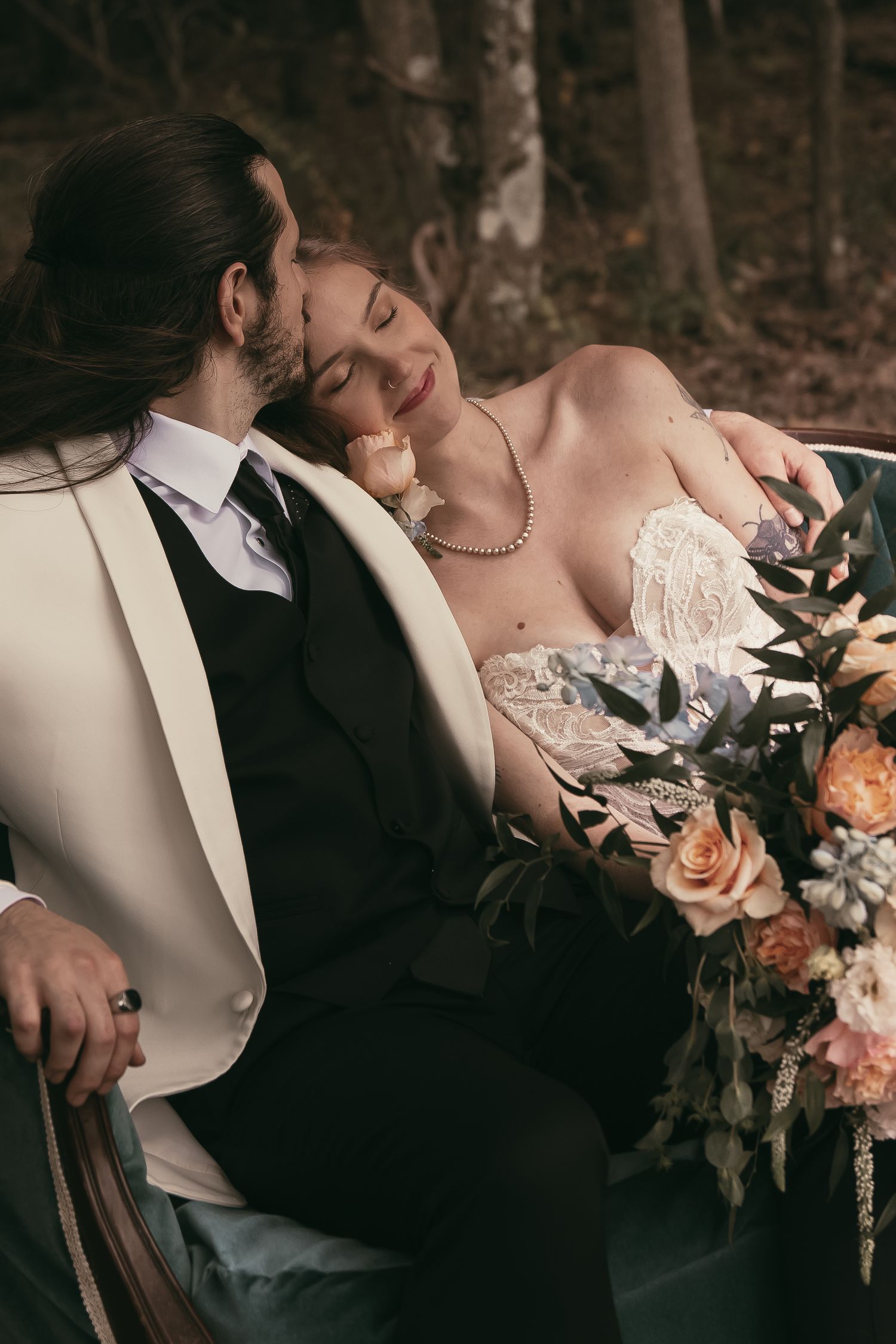 Newlyweds sharing kiss in Hermitage Pennsylvania by Gypsy Lens Photography. Moody, vintage, documentary wedding photographer.