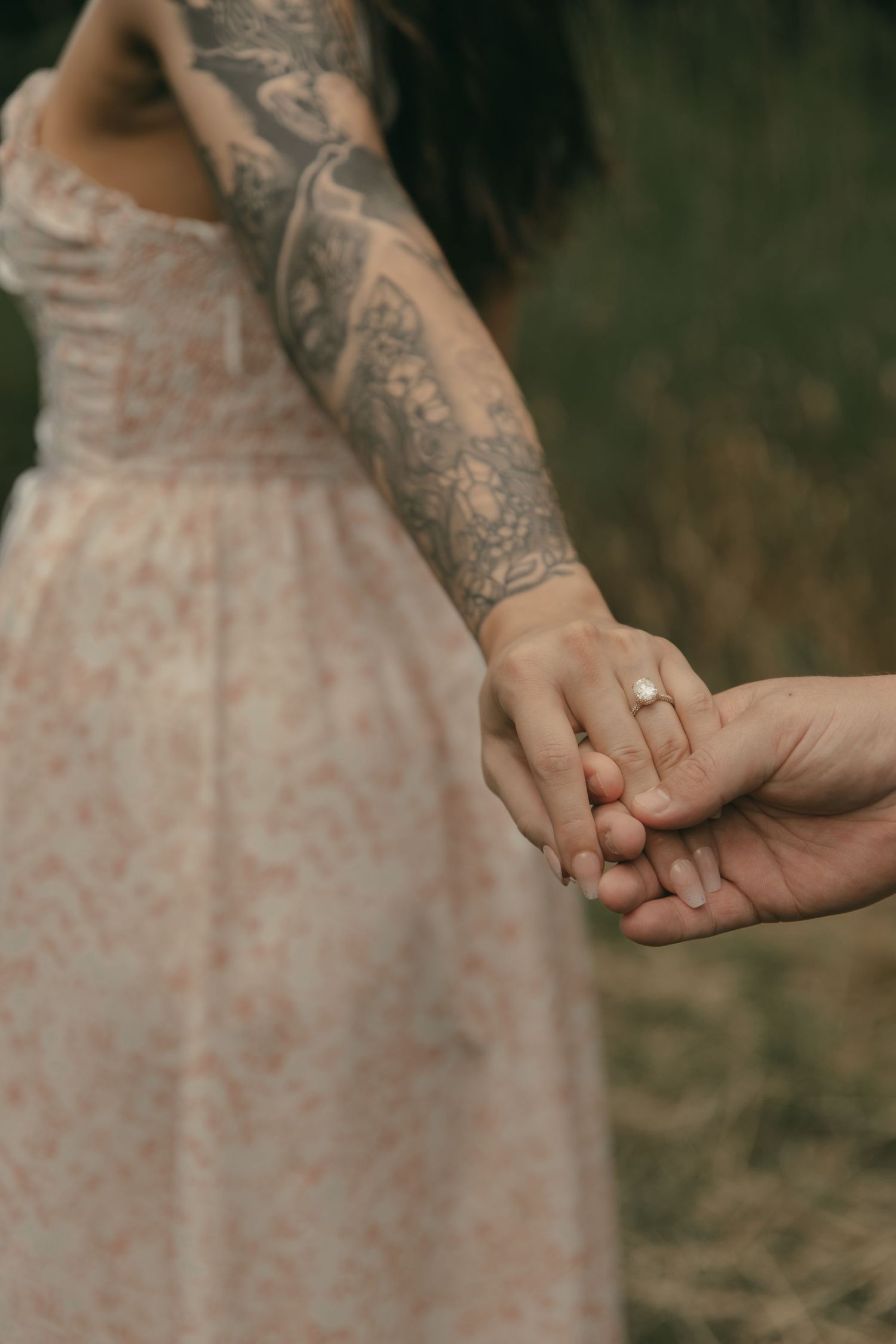Engagement ring in a wildflower meadow in Lake County Ohio by Gypsy Lens Photography. Moody, filmy, vintage, documentary wedding photography