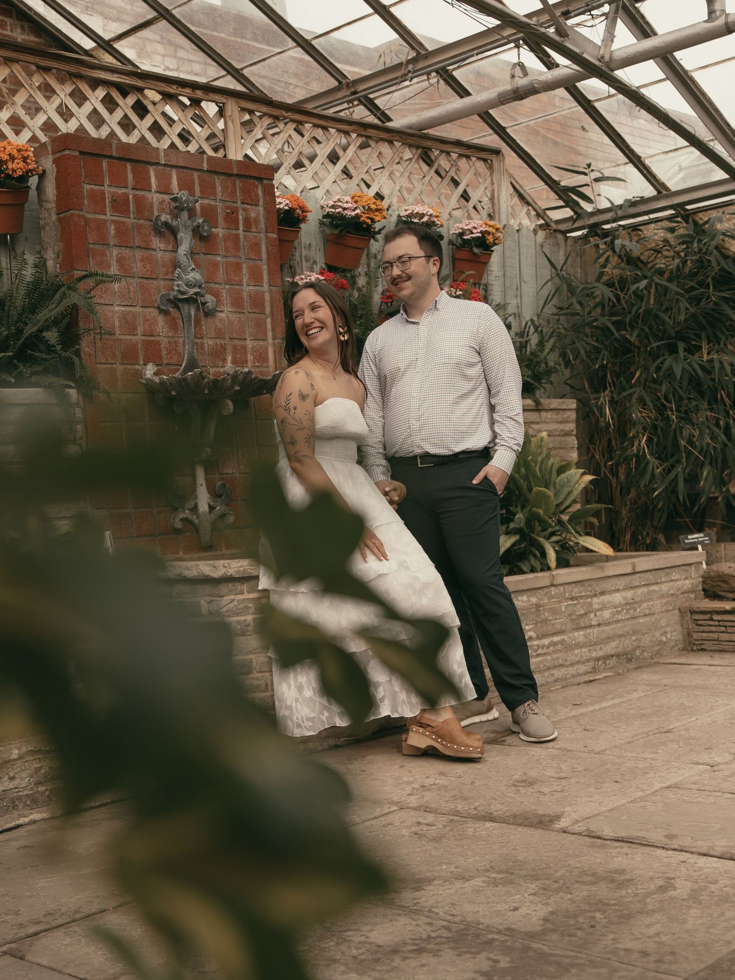 Couple smiling together in Cleveland Ohio by Gypsy Lens Photography. Moody, nostalgic, vintage, documentary wedding photography