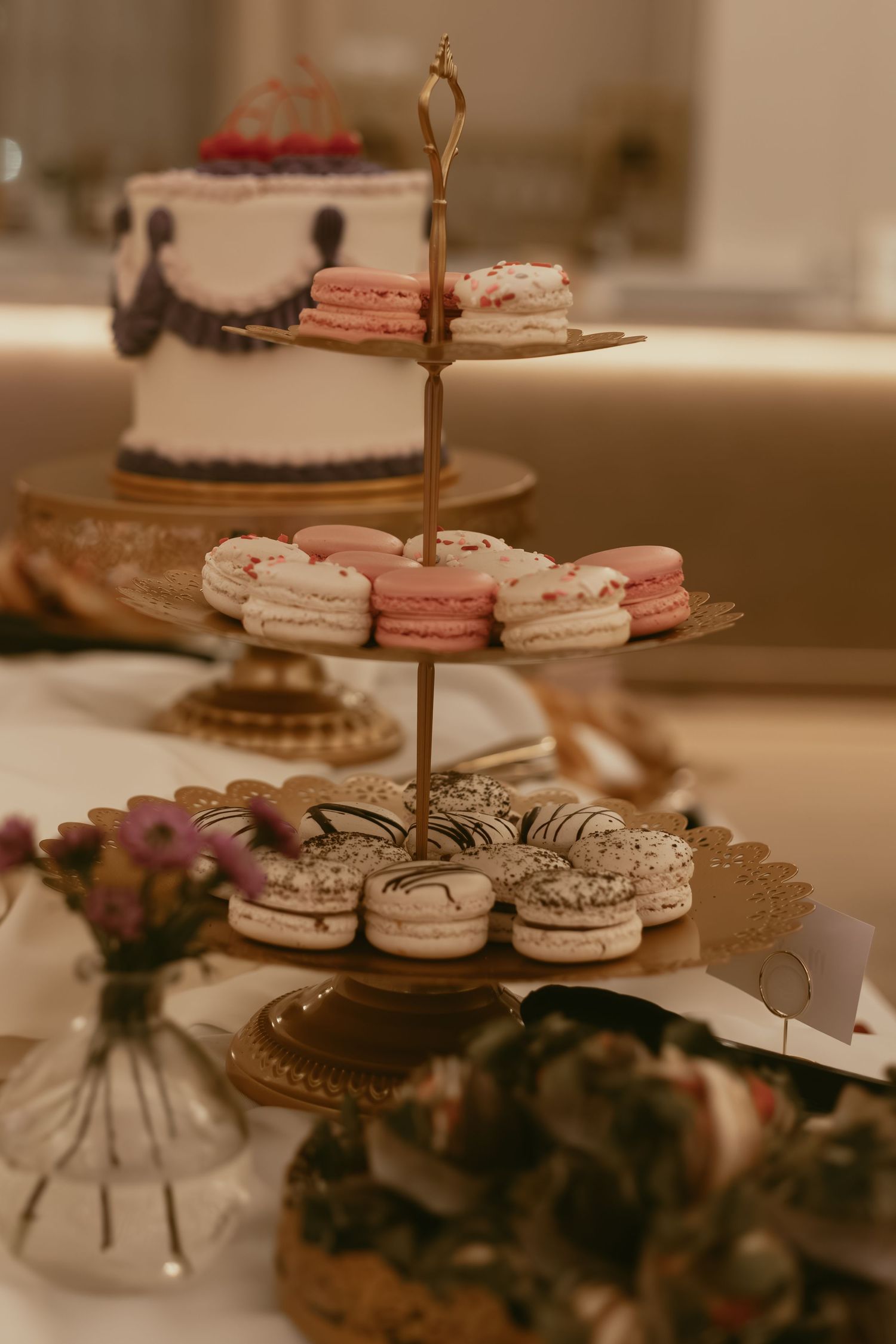 Vintage dessert table with wedding cake in Cleveland Ohio by Gypsy Lens Photography. Moody, filmy, vintage, documentary wedding photography.