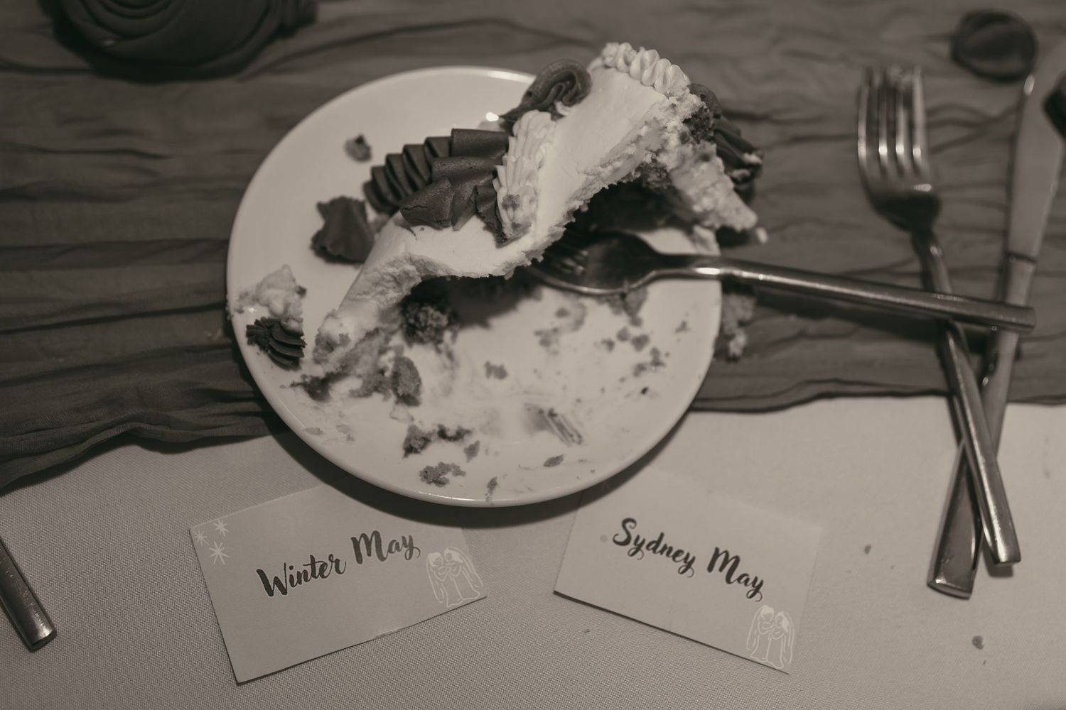 Late night flat lay of cake and names in Cleveland Ohio by Gypsy Lens Photography. Moody, filmy, vintage, documentary wedding photography.