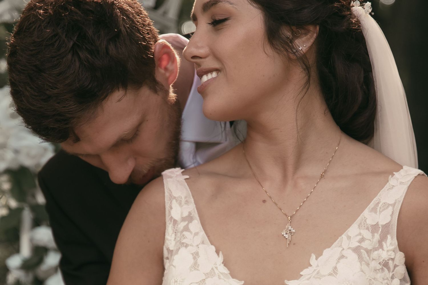 Close-up of tender moment between newlyweds in Cleveland Ohio by Gypsy Lens Photography. Moody, vintage, nostalgic, documentary wedding.