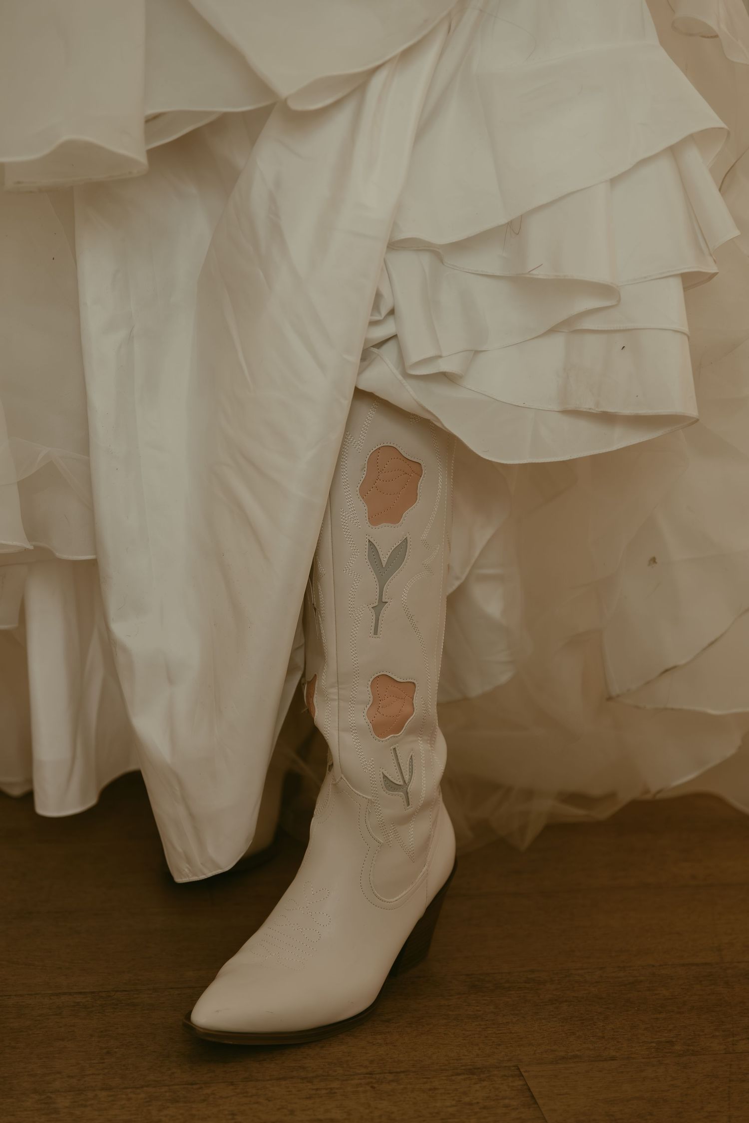 Close up of shoes under wedding dress in Cleveland Ohio by Gypsy Lens Photography. Moody, filmy, vintage, documentary wedding photography.