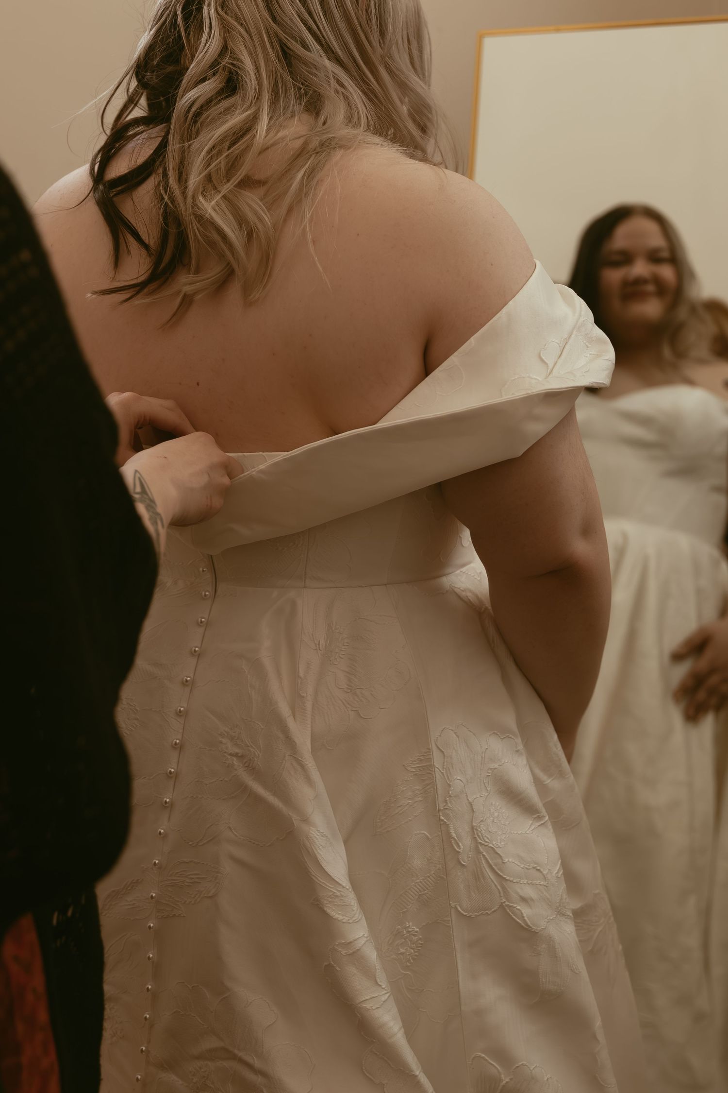 Bride getting dressed for wedding in Cleveland Ohio by Gypsy Lens Photography. Moody, filmy, vintage, documentary wedding photography.