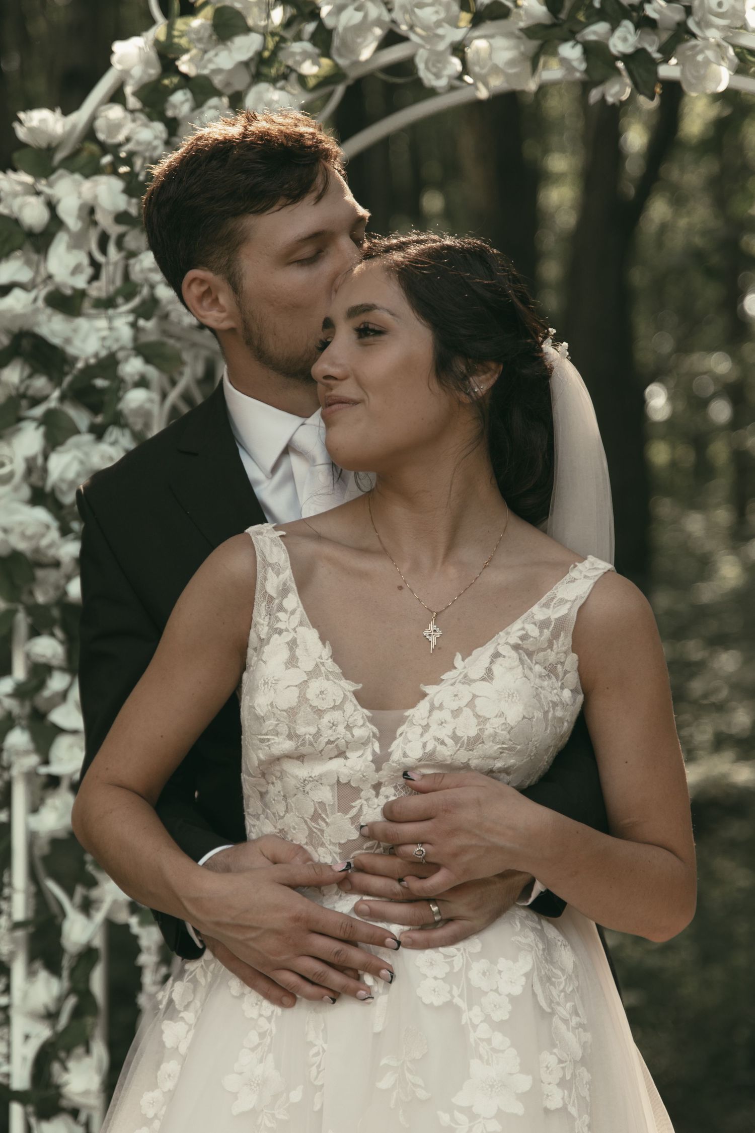 Romantic wedding portraits showing tender moments between newlyweds in Tallmadge Ohio by Gypsy Lens Photography. Moody wedding.