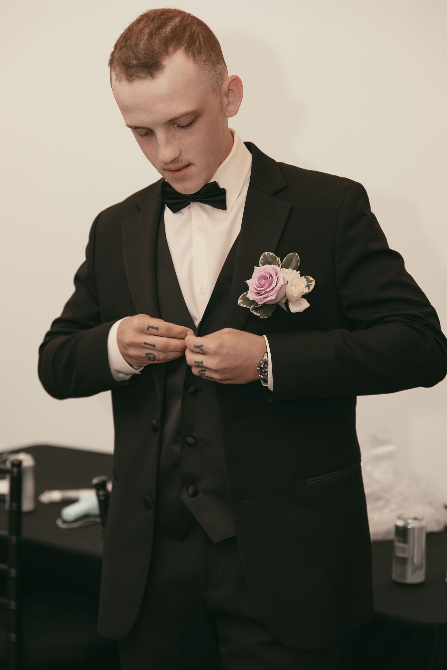 Groom getting ready in Cleveland Ohio by Gypsy Lens Photography. Moody, vintage, documentary wedding photographer.