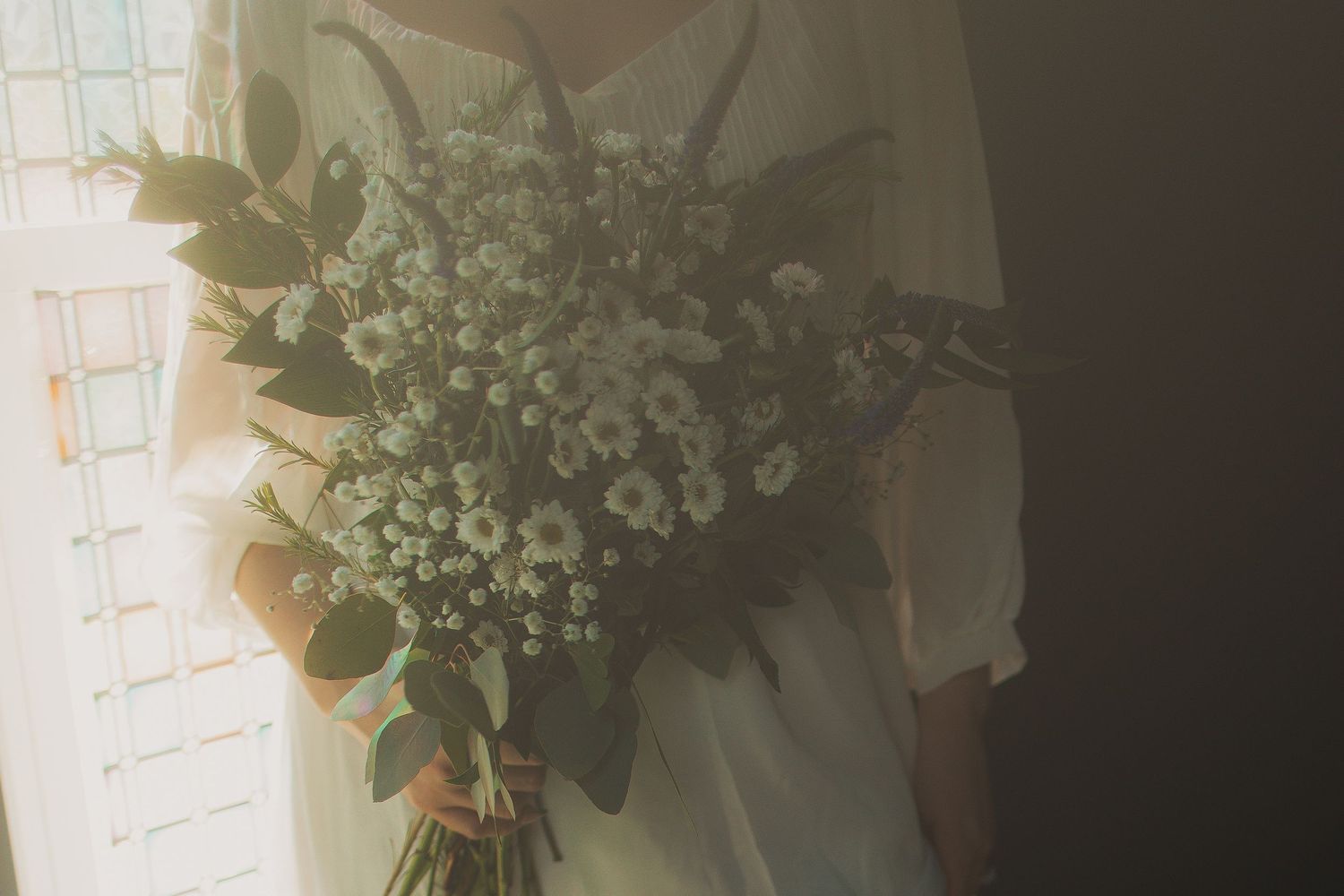 Bridal bouquet with vintage vibe in Akron Ohio by Gypsy Lens Photography. Moody, vintage, nostalgic, documentary wedding photography.