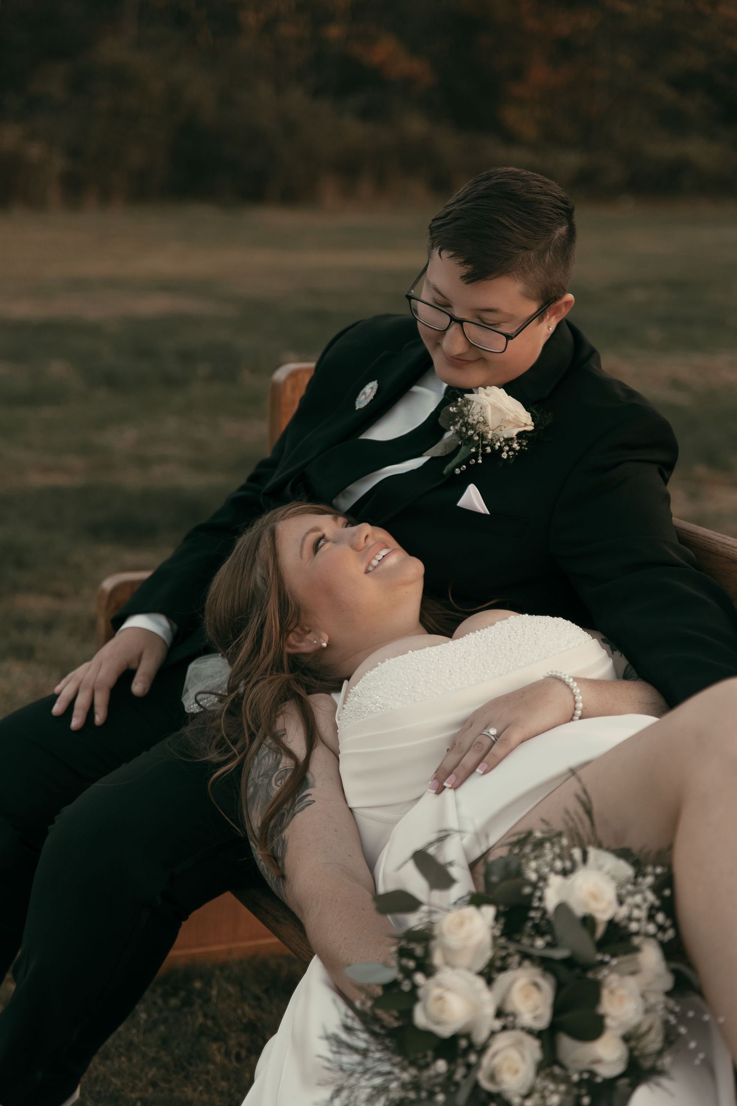 Romantic wedding couple poses outdoors at sunset in Cleveland Ohio by Gypsy Lens Photography. Moody, vintage, nostalgic, documentary.
