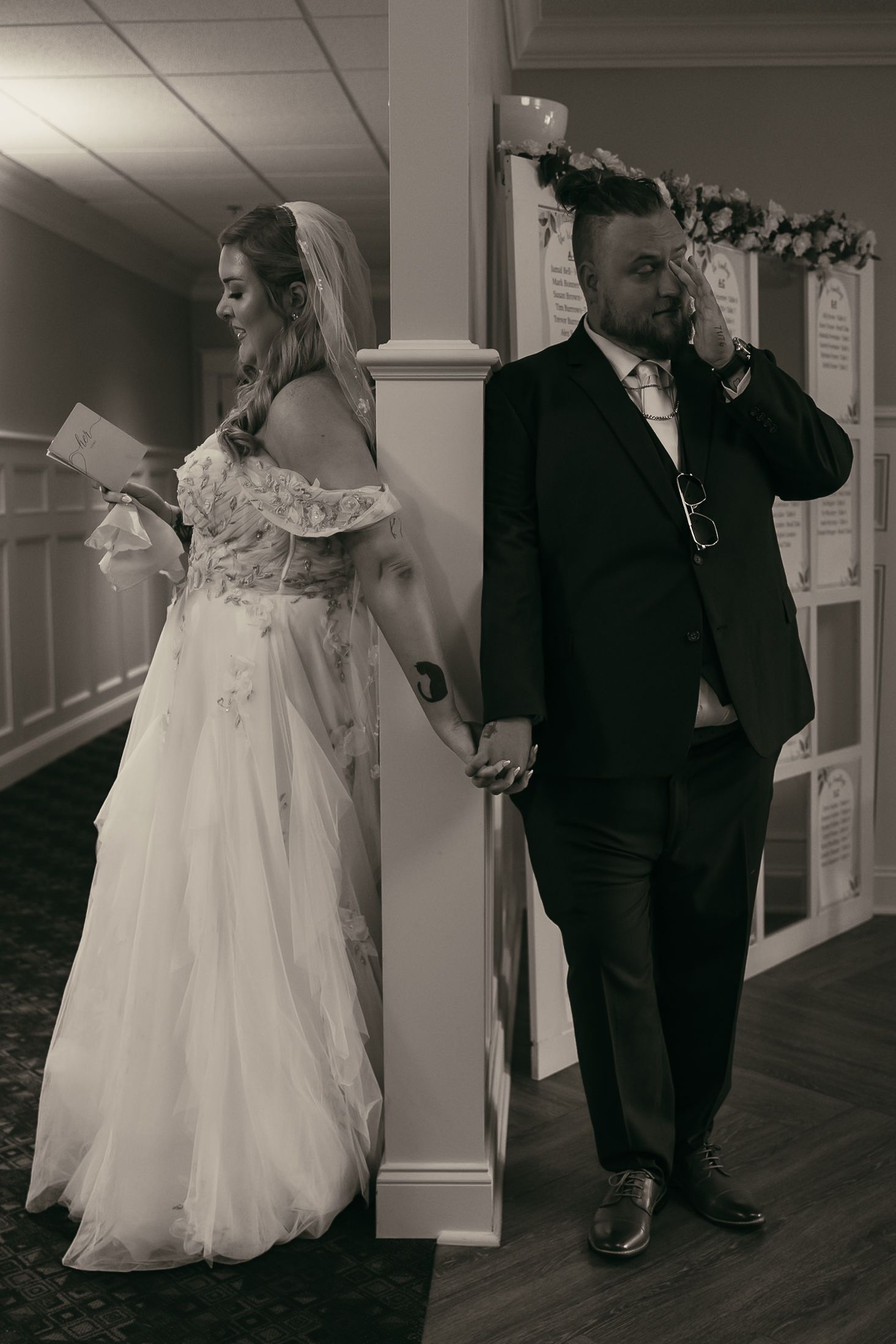 Bride and groom at first touch in Akron Ohio by Gypsy Lens Photography. Moody, filmy, vintage, documentary wedding photography.