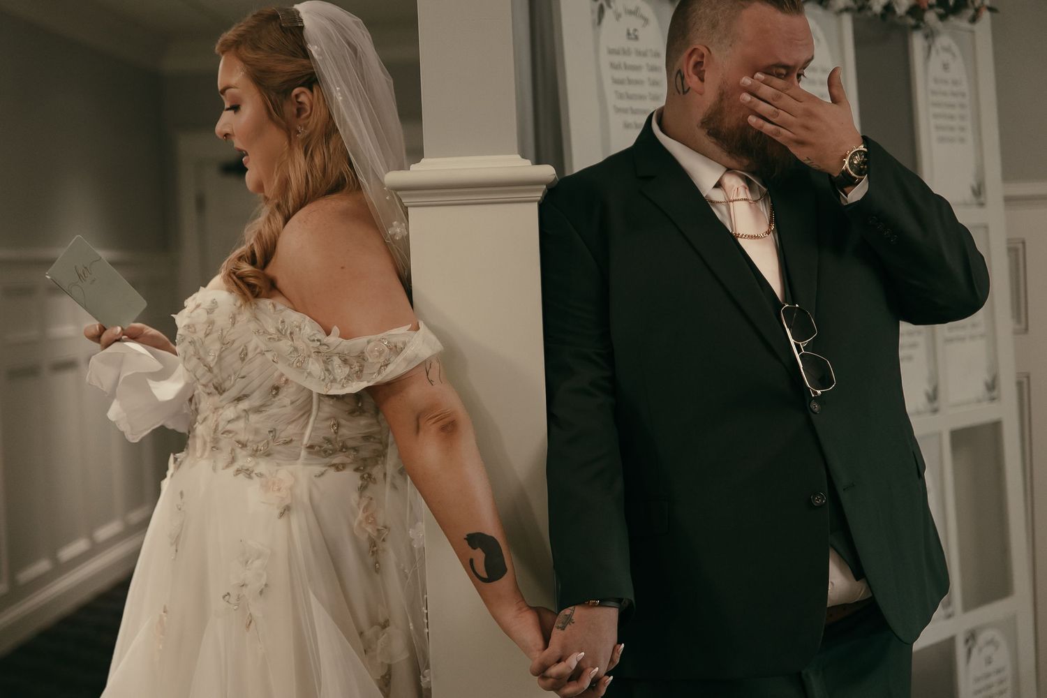 Couple crying at first touch with vows in Akron Ohio by Gypsy Lens Photography. Moody, filmy, vintage, documentary wedding photography.