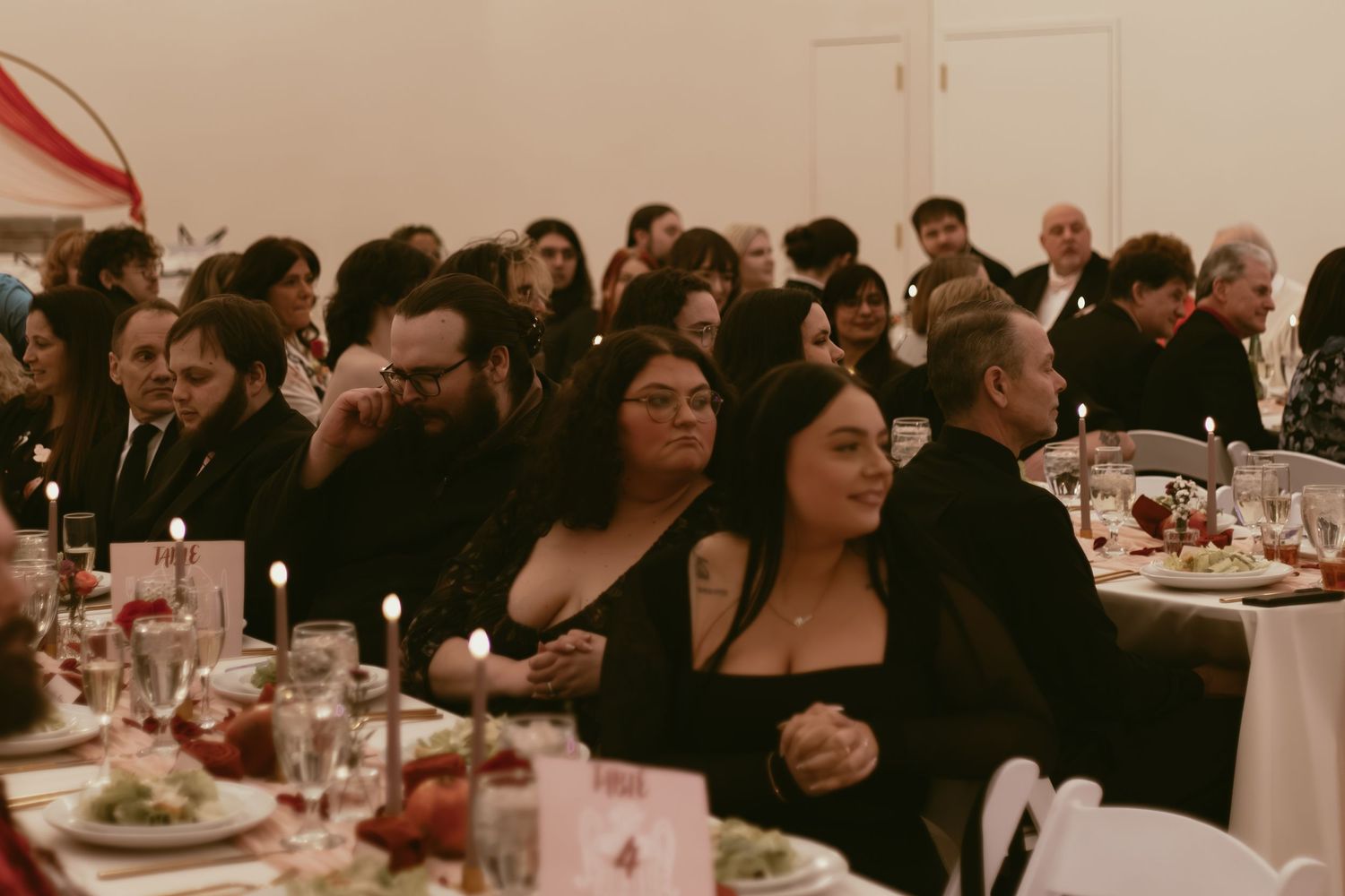 Wedding guests happy to see brides in Cleveland Ohio by Gypsy Lens Photography. Moody, filmy, vintage, documentary wedding photography.