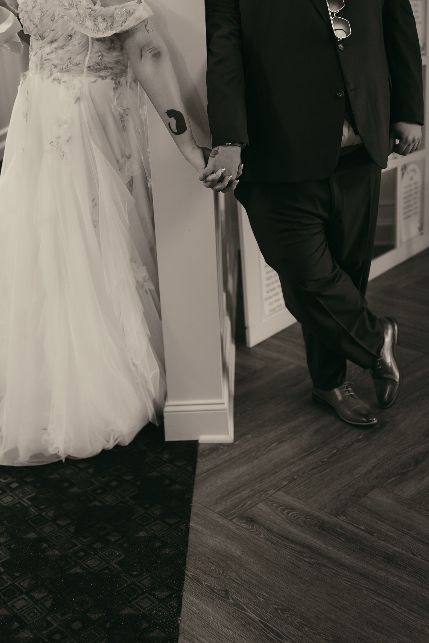 Black and white couples hands in Akron Ohio by Gypsy Lens Photography. Moody, filmy, vintage, documentary wedding photography.
