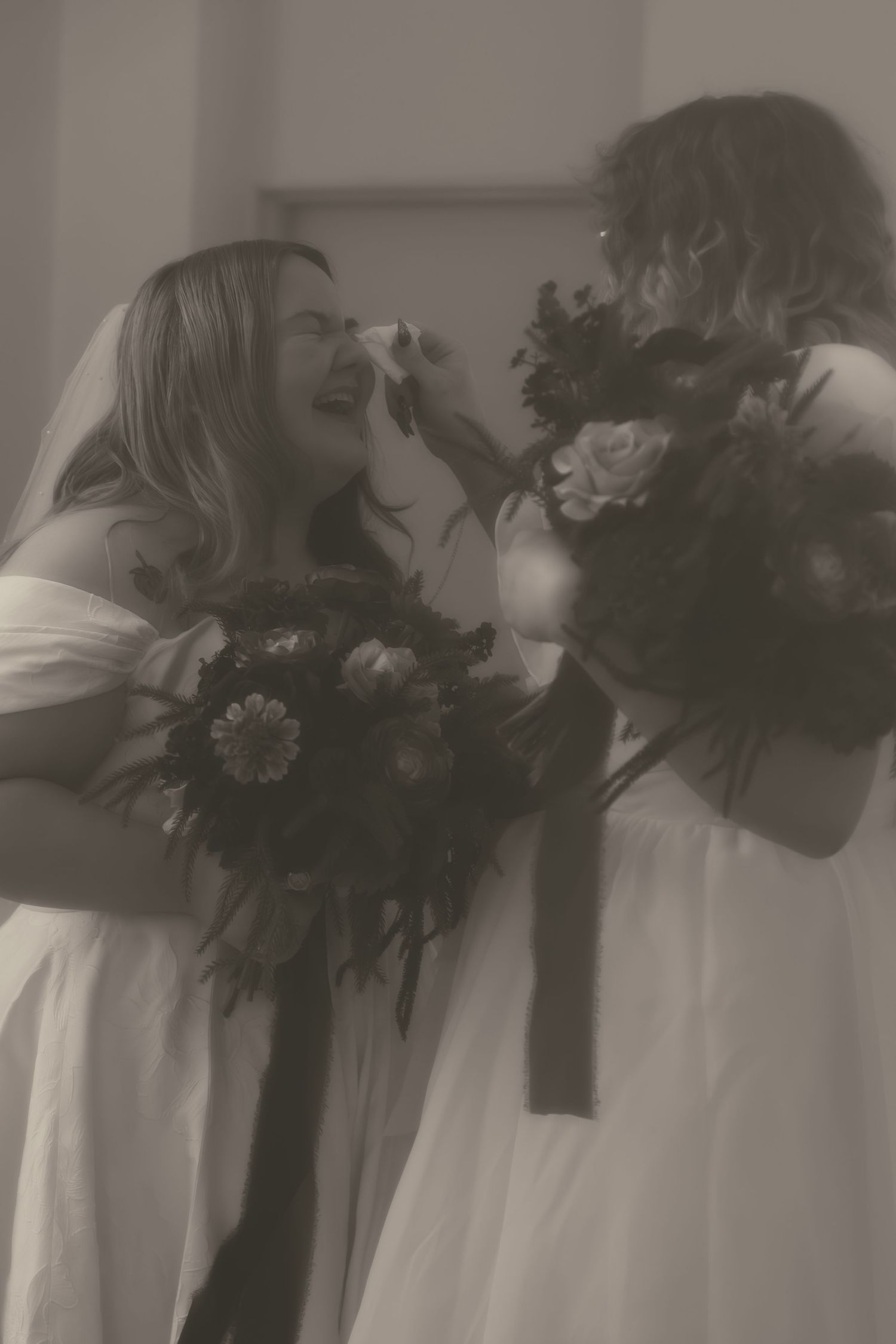 Emotional brides at first look in Cleveland Ohio by Gypsy Lens Photography. Moody, filmy, vintage, documentary wedding photography.