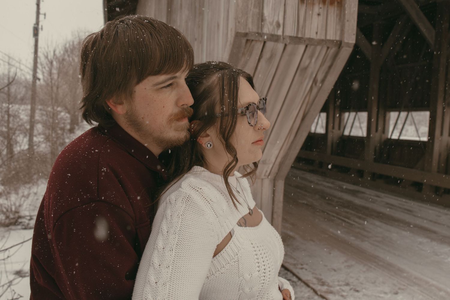Intimate couple moment in Ashtabula Ohio by Gypsy Lens Photography. Moody, vintage, documentary wedding photography.