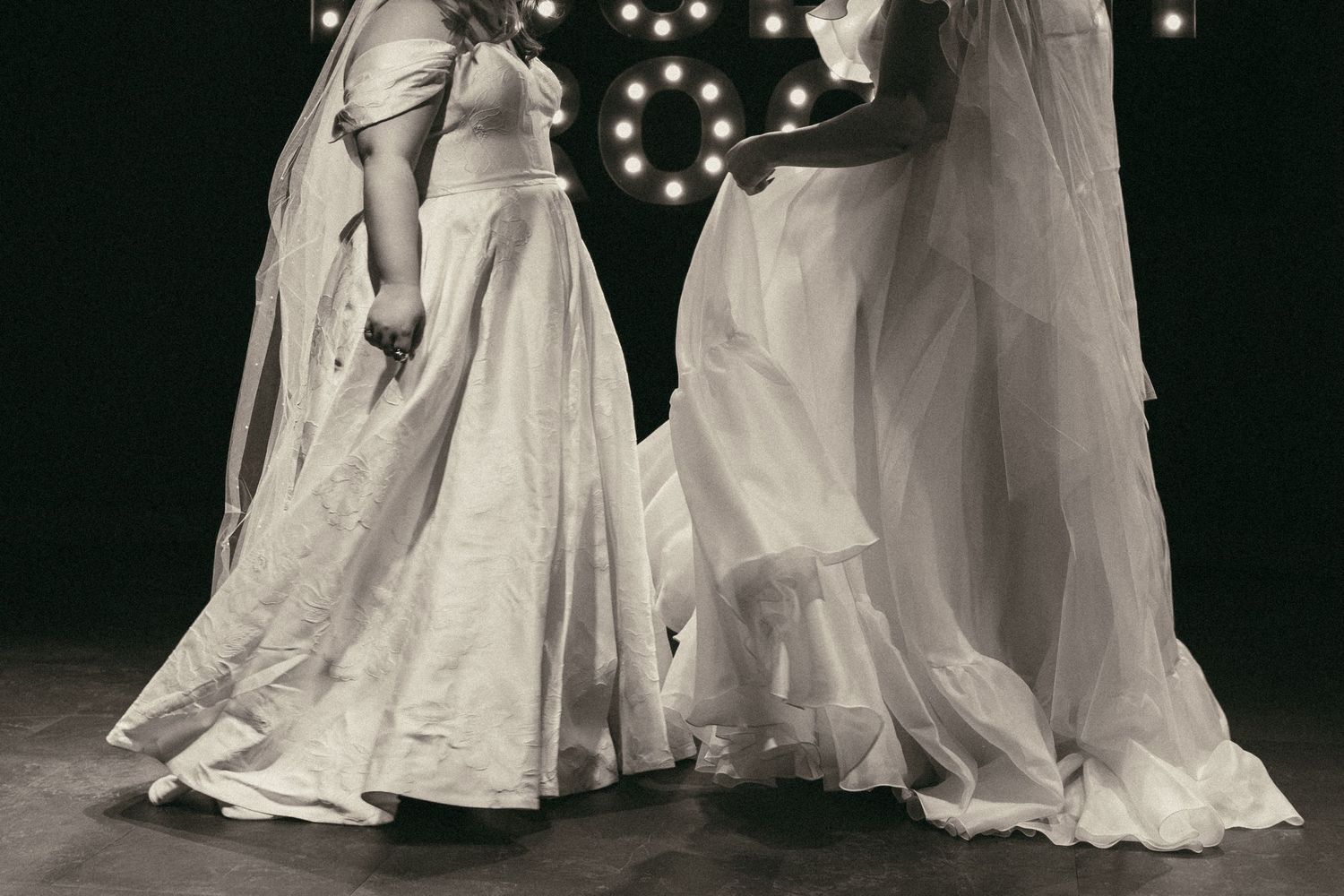Two brides motion blur grainy dancing in Cleveland Ohio by Gypsy Lens Photography. Moody, filmy, vintage, documentary wedding photography.