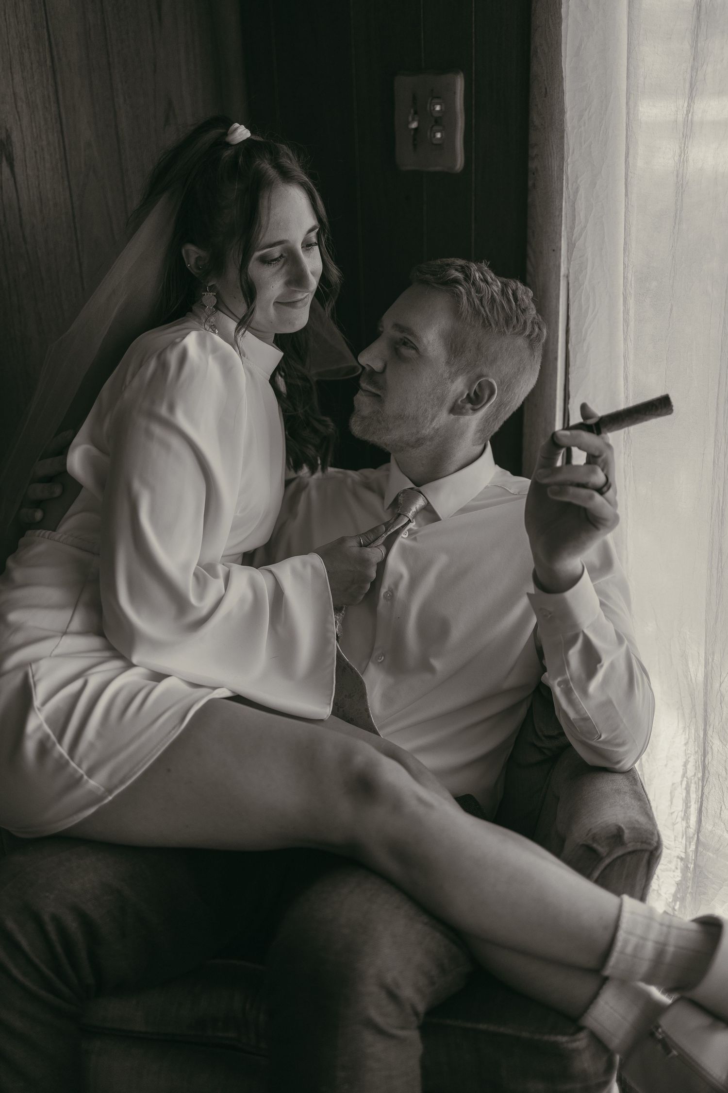 Intimate moment of couple during elopement in Akron Ohio by Gypsy Lens Photography. Moody, nostalgic documentary wedding photography.