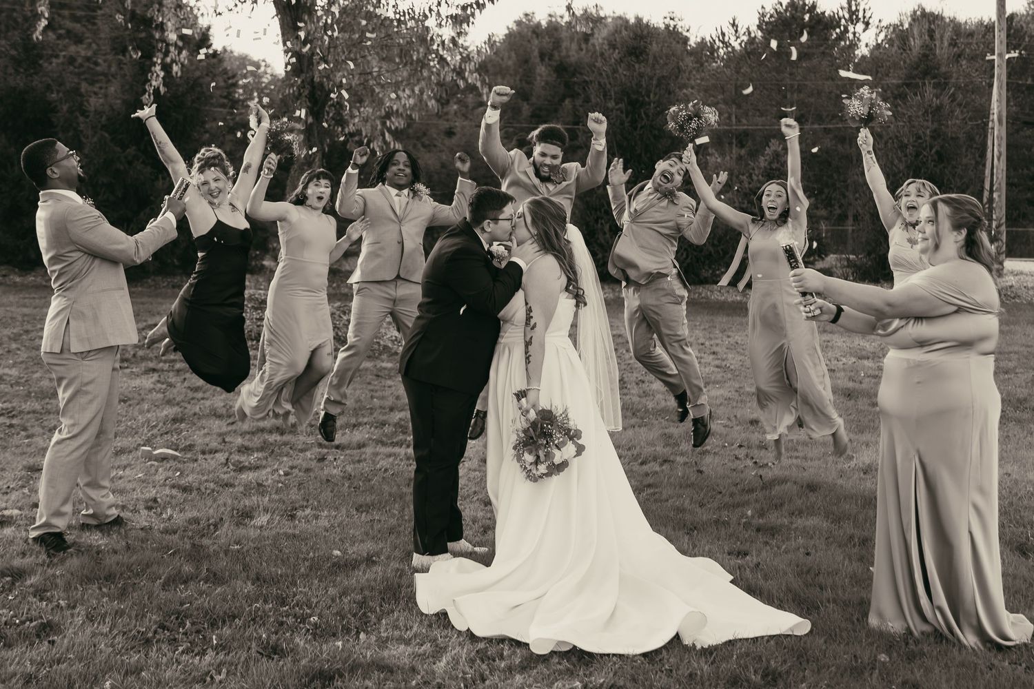 Wedding party celebrates joyfully after two brides marry in Cleveland Ohio by Gypsy Lens Photography, documentary wedding photographer
