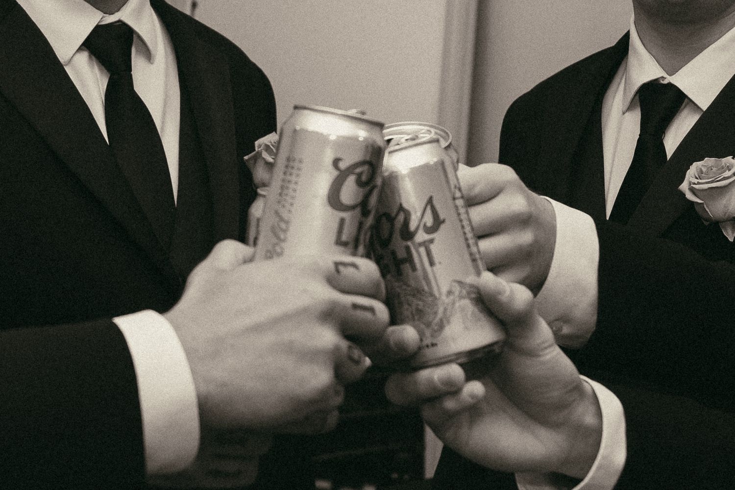 Groomsmen toasting in Cleveland Ohio by Gypsy Lens Photography. Moody, vintage, documentary wedding photographer.