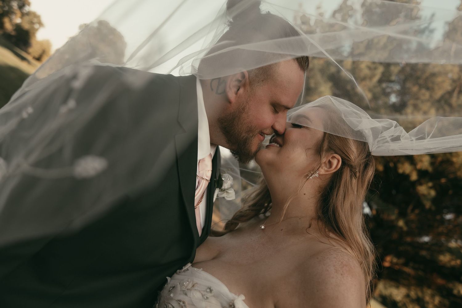Bride and groom at golf course in Akron Ohio by Gypsy Lens Photography. Moody, filmy, vintage, documentary wedding photography.