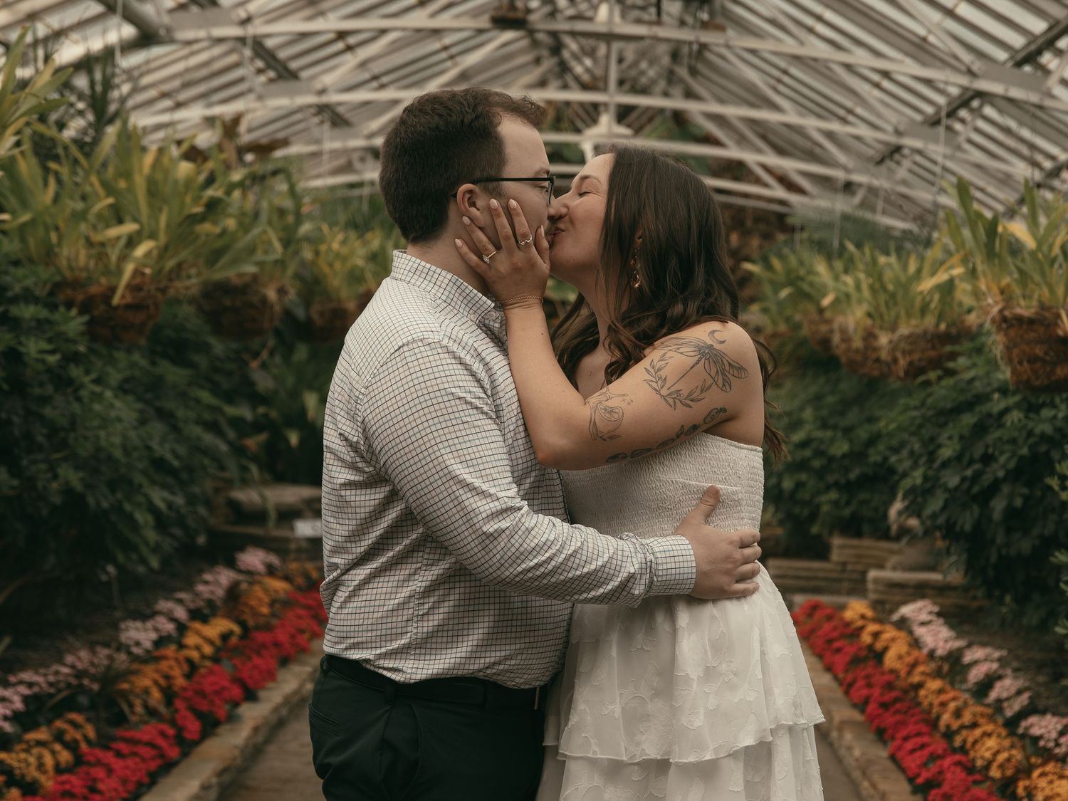 Engaged couple kissing in Cleveland Ohio by Gypsy Lens Photography. Moody, nostalgic, vintage, documentary wedding photography
