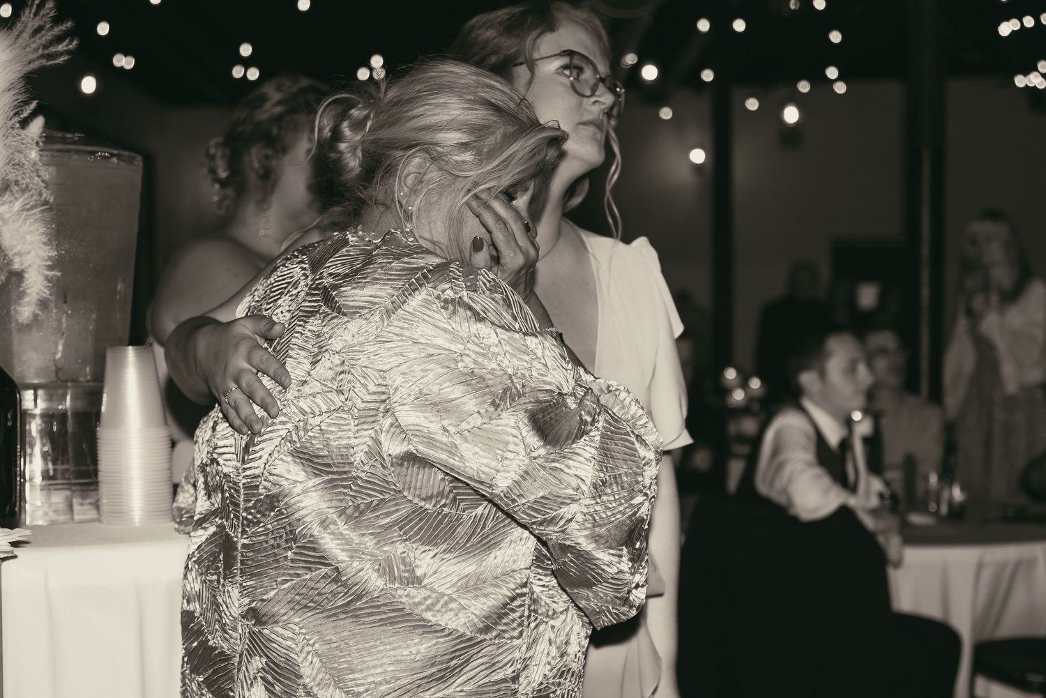 Emotional moment for mom of bride in Cleveland Ohio by Gypsy Lens Photography. Moody, vintage, documentary wedding photographer.