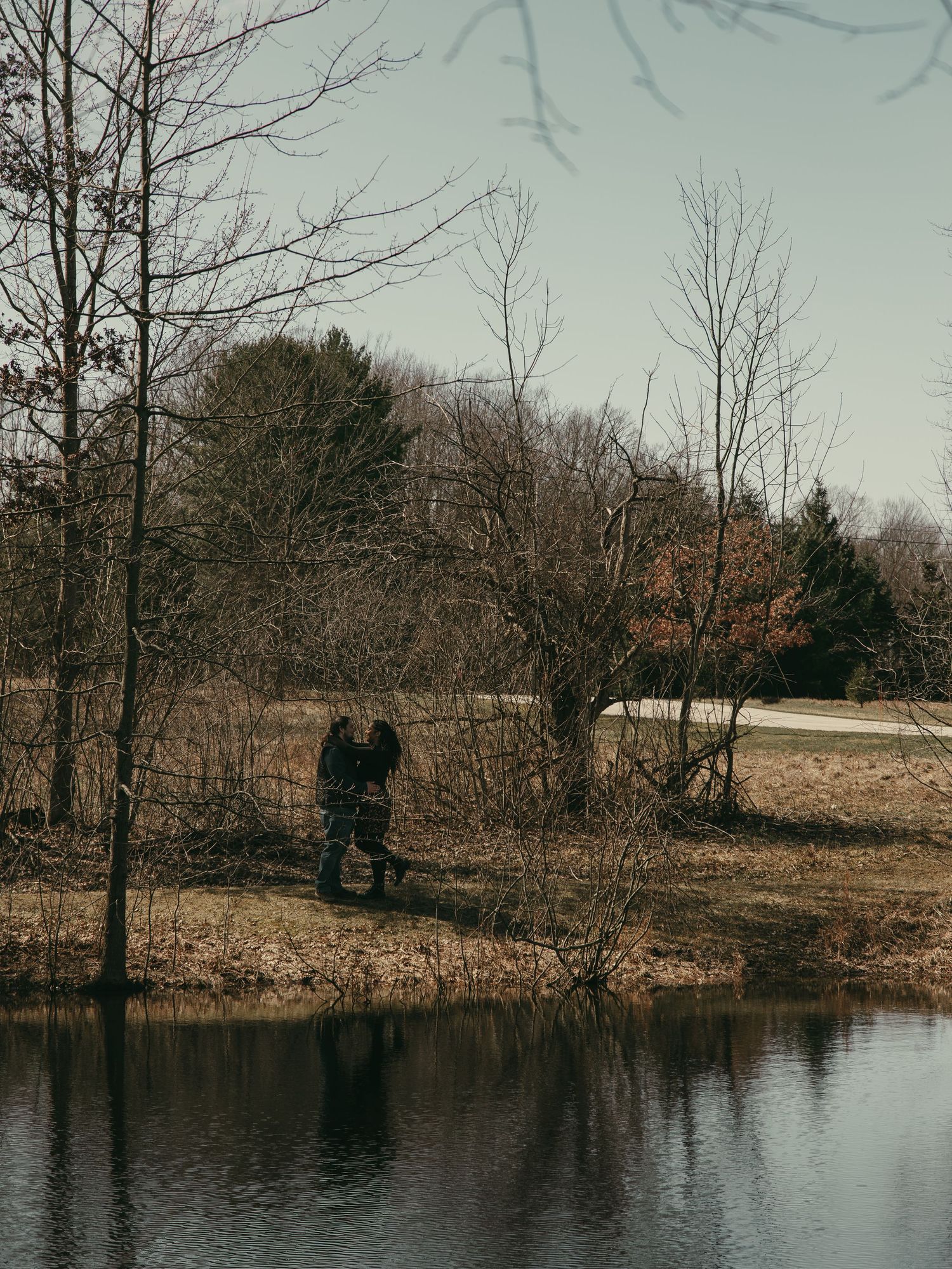 Wide angle of couple at park in Cleveland Ohio by Gypsy Lens Photography. Moody, nostalgic, vintage, documentary wedding photography