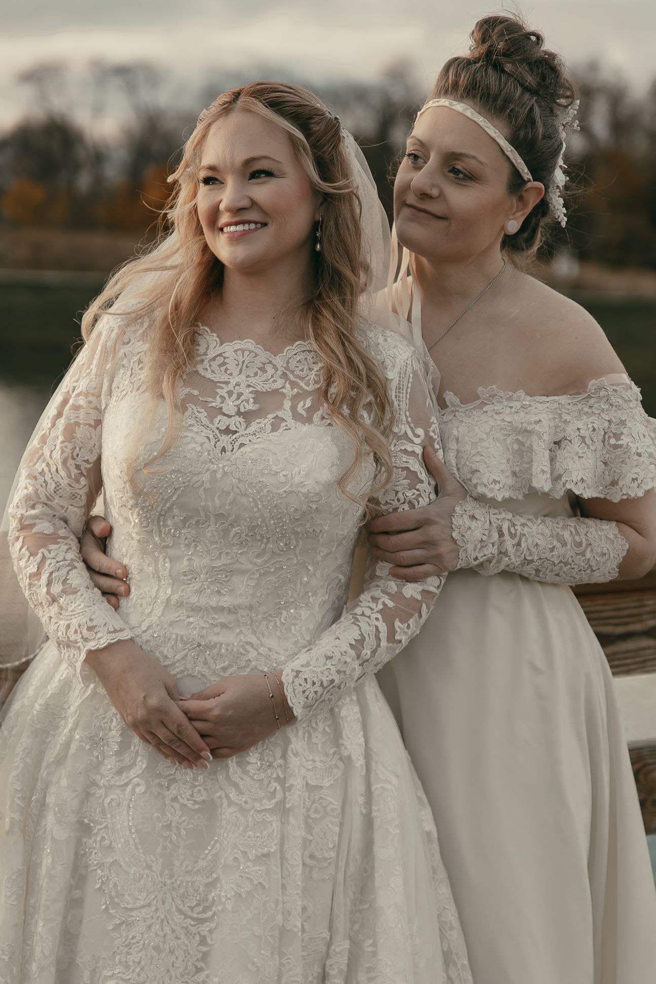 Cinematic sunset bridal portraits at wedding in Lake County Ohio by Gypsy Lens Photography. Moody, vintage, documentary wedding photography.