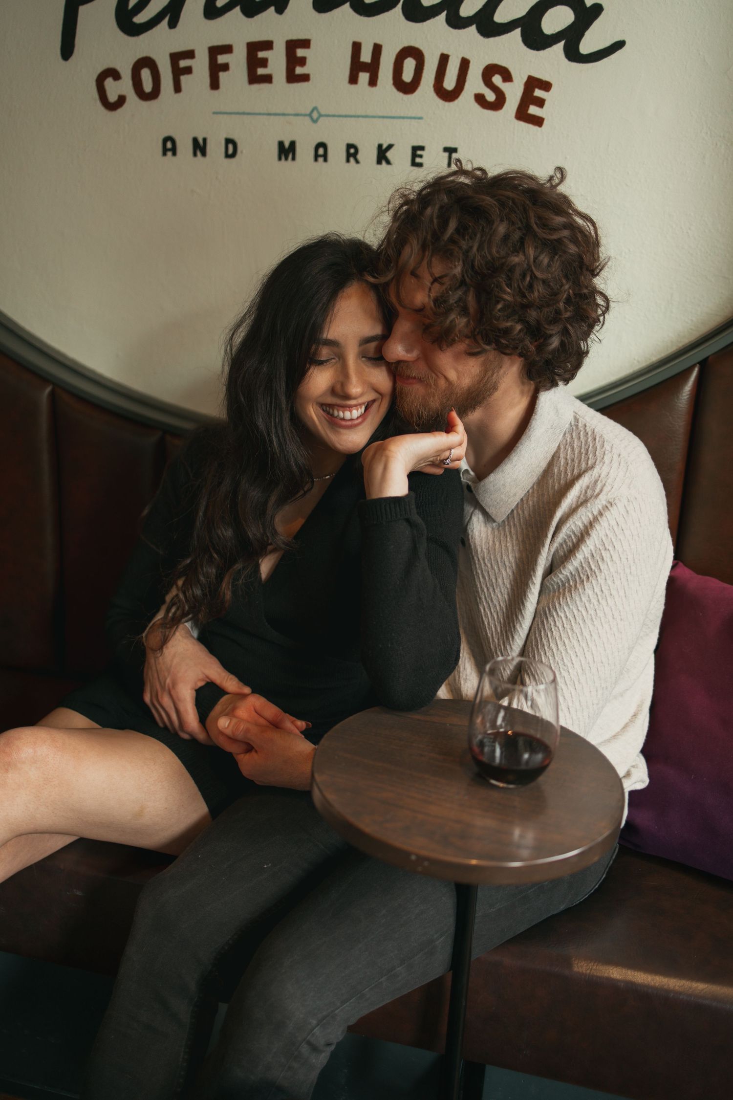 Engagement session at coffee shop in Cleveland Ohio by Gypsy Lens Photography. Moody, vintage, documentary wedding photographer.