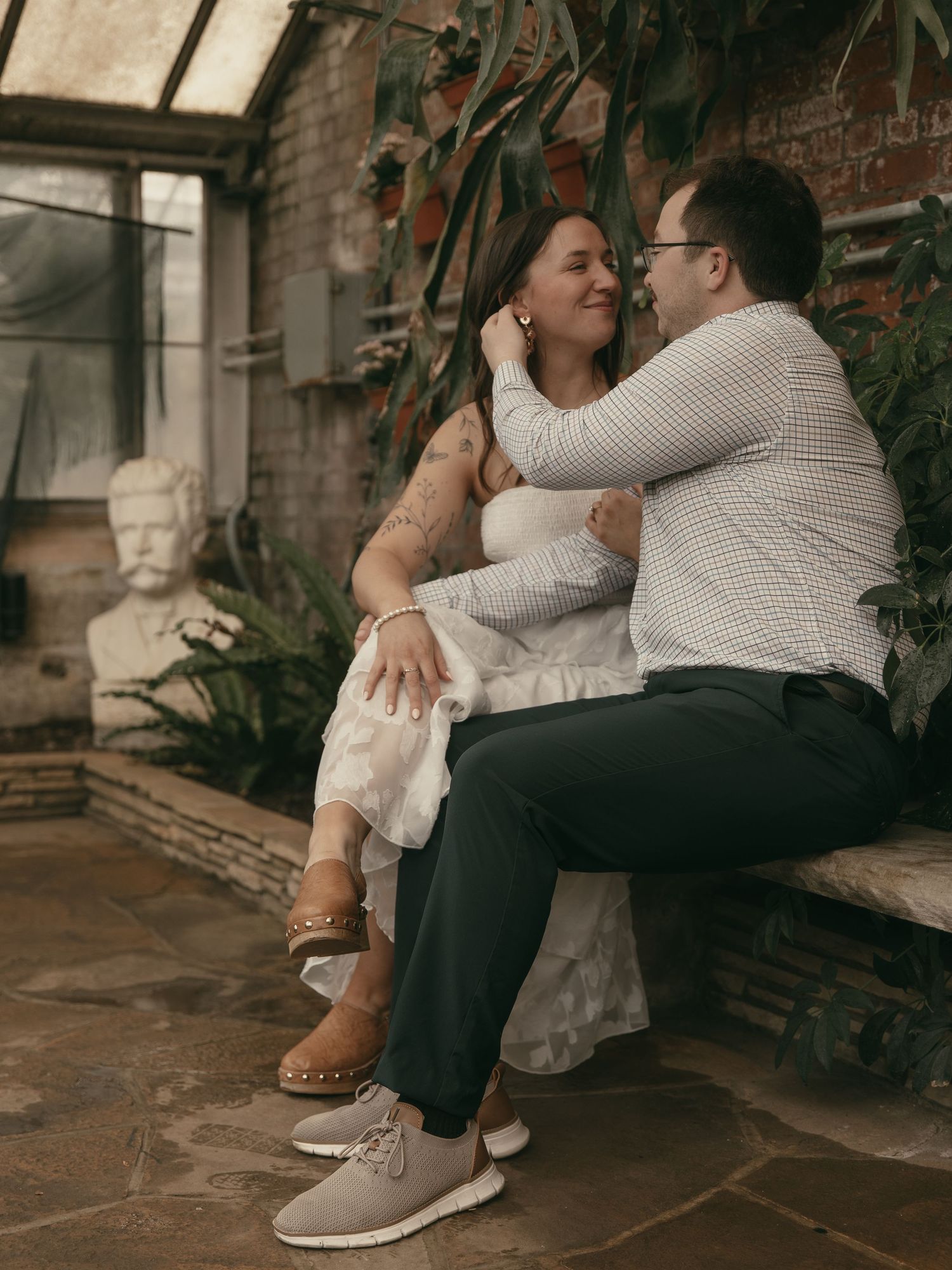 Couple at Rockefeller Greenhouse in Cleveland Ohio by Gypsy Lens Photography. Moody, nostalgic, vintage, documentary wedding photography