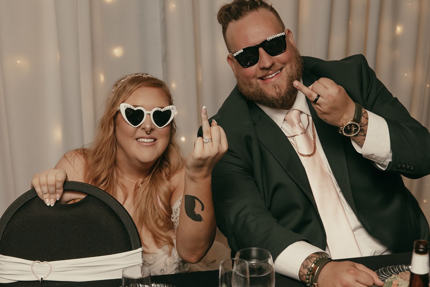 Bride and groom showing off rings in Akron Ohio by Gypsy Lens Photography. Moody, filmy, vintage, documentary wedding photography.