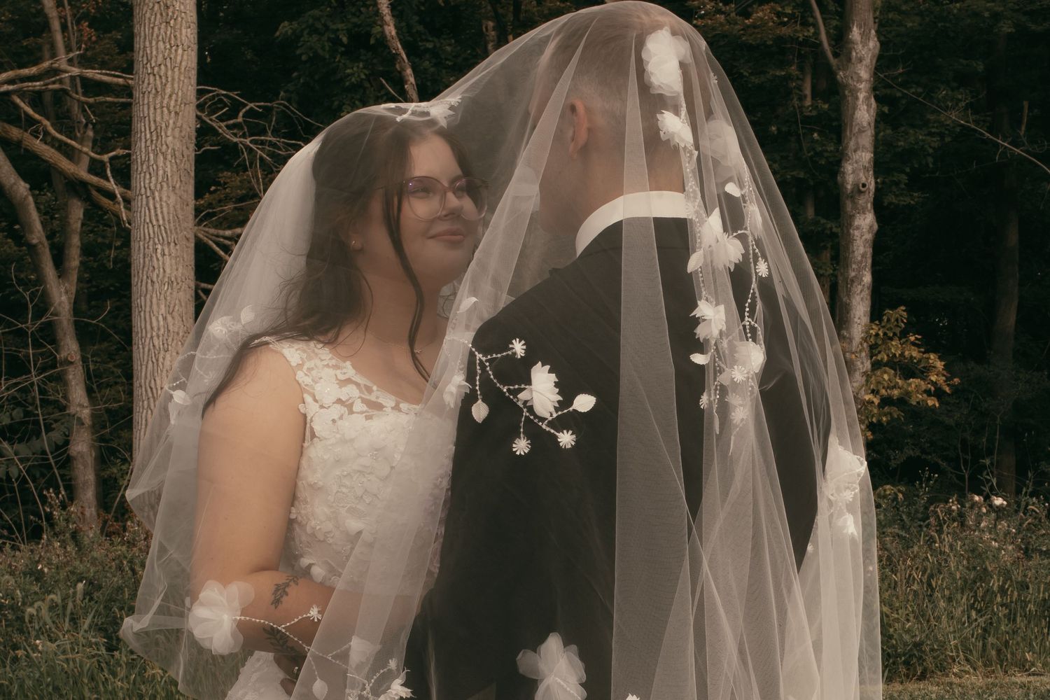 Bridal portraits under veil in Cleveland Ohio by Gypsy Lens Photography. Moody, vintage, documentary wedding photographer.