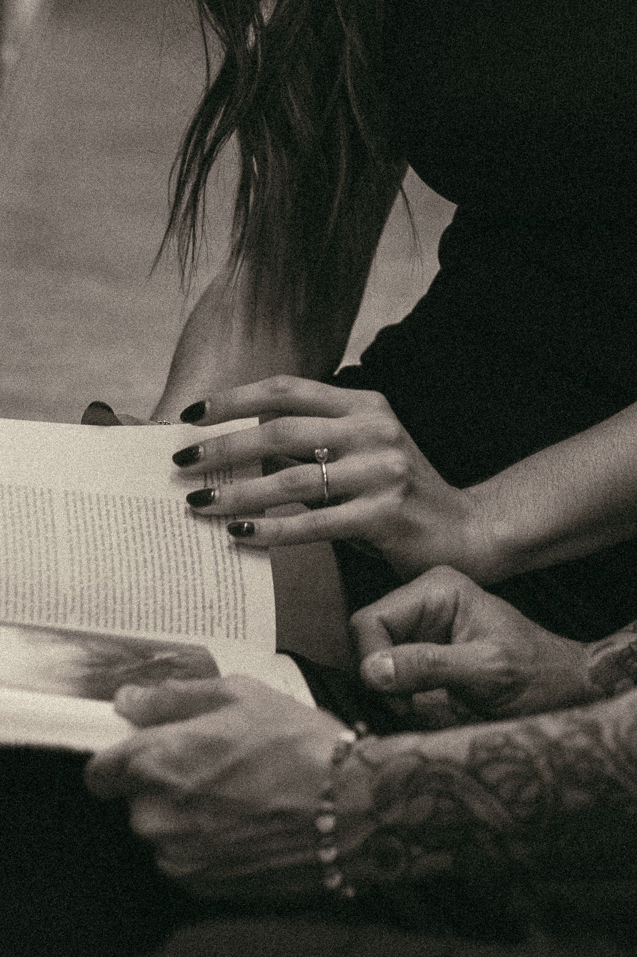 Couple reading together at library in Cleveland Ohio by Gypsy Lens Photography. Moody, filmy, vintage, documentary wedding photography